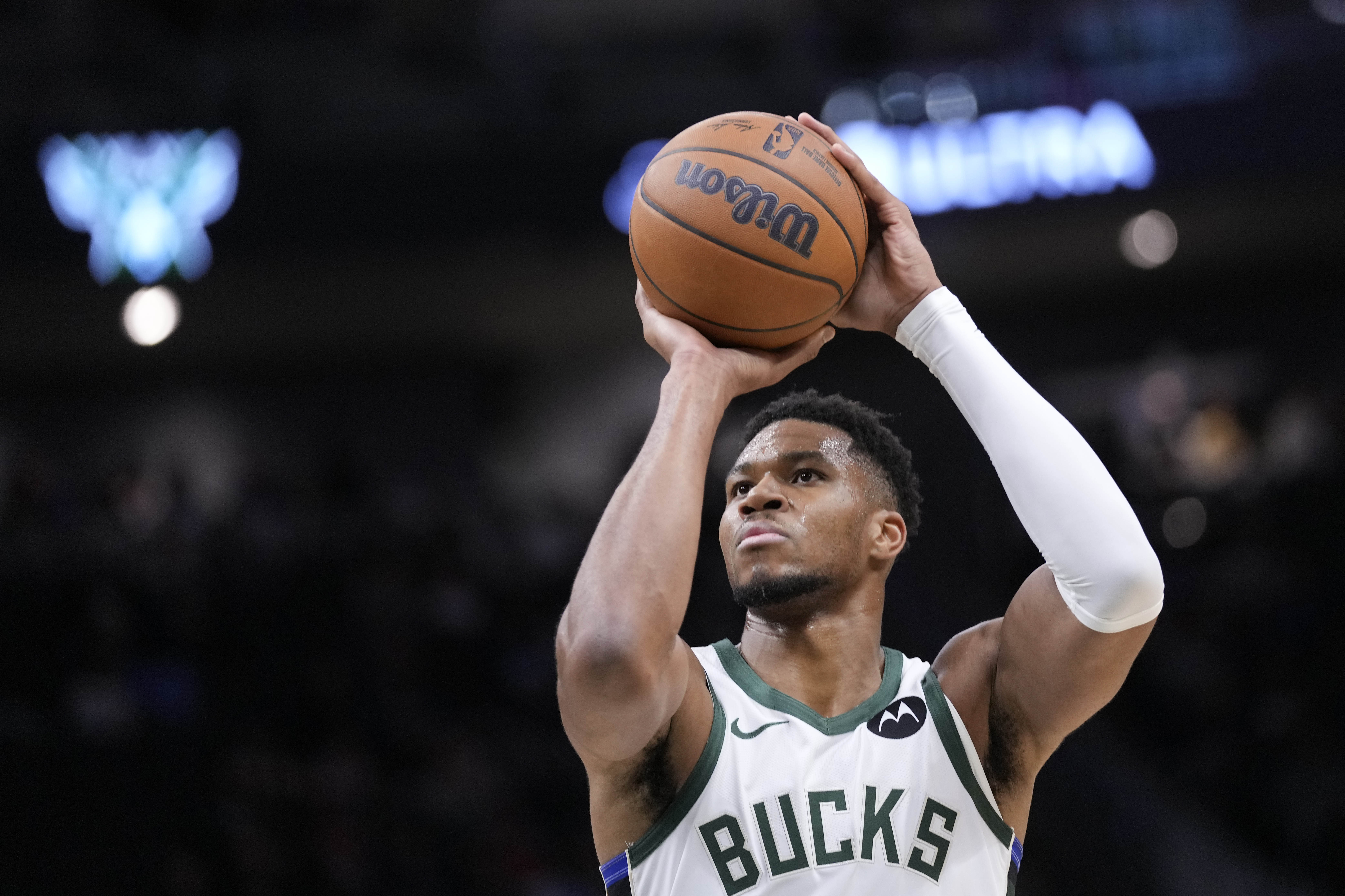 Milwaukee Bucks' Giannis Antetokounmpo shoots a free throw against the Chicago Bulls during the first half of an NBA preseason basketball game Monday, Oct. 14, 2024, in Milwaukee. 