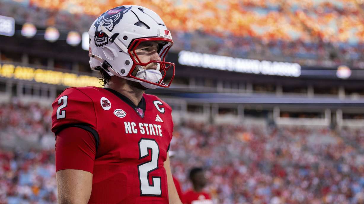FILE - North Carolina State quarterback Grayson McCall (2) during the pre game warm up of an NCAA college football game, Sept. 8, 2024, in Charlotte, N.C.