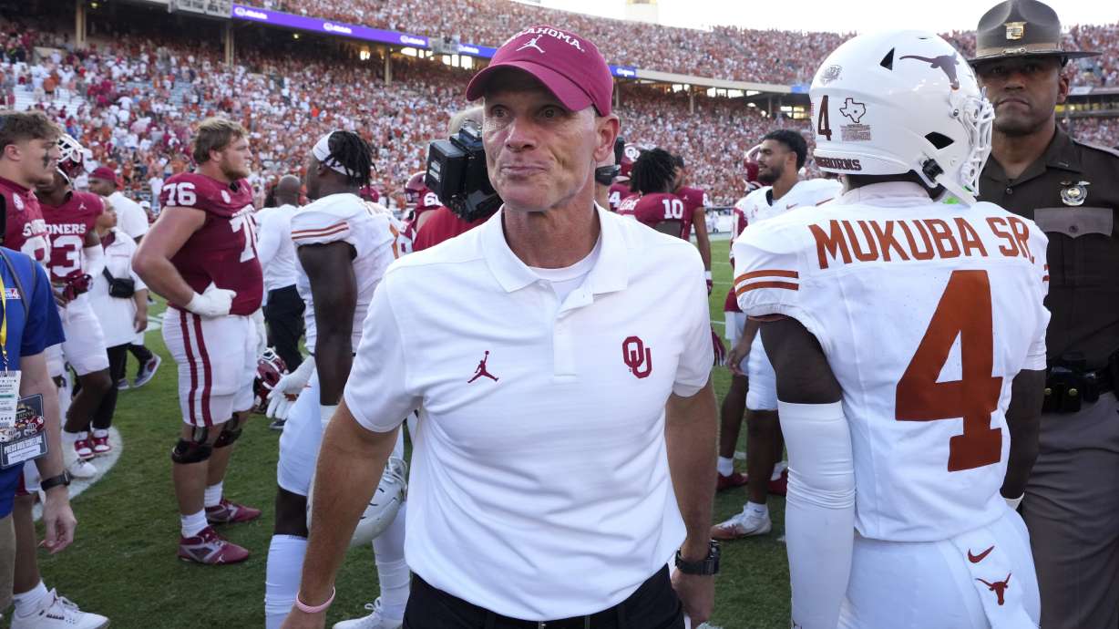 Oklahoma head football coach Brent Venables walks off the field after his team's 34-3 loss to Texas in an NCAA college football game in Dallas, Saturday, Oct. 12, 2024.