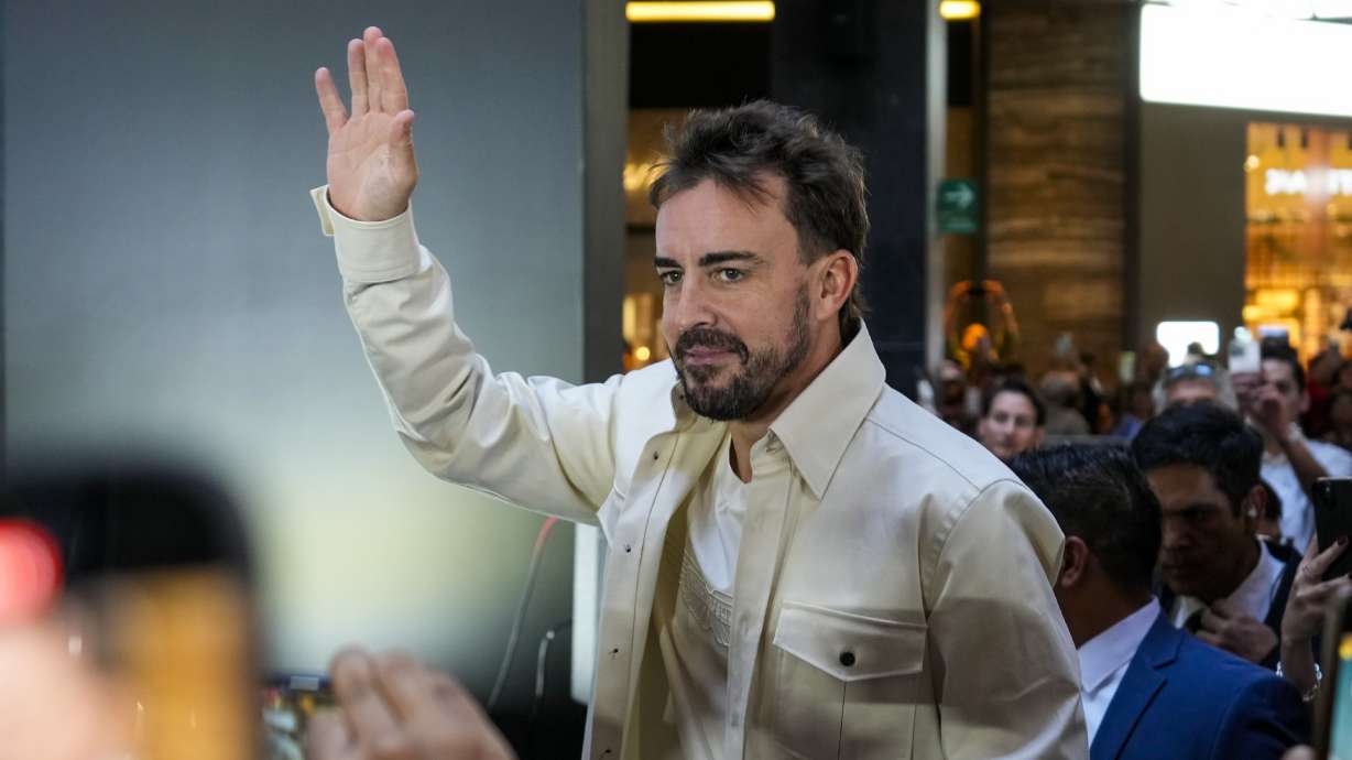 Aston Martin driver Fernando Alonso of Spain arrives at a promotional event in Mexico City, Wednesday, Oct. 23, 2024, ahead of the weekend Formula One Mexico Grand Prix auto race.
