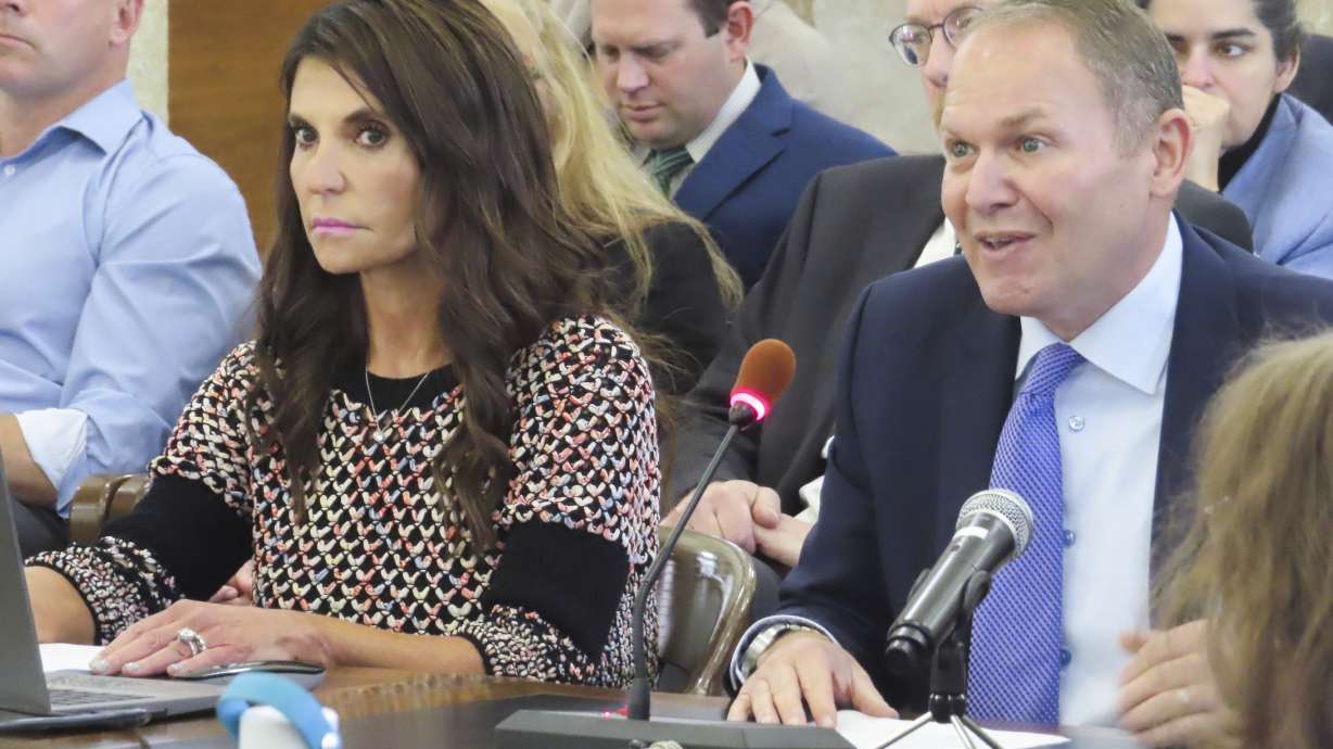 Lori Kalani, chief responsible gaming officer for DraftKings, left, and Jeremy Kudon, president of the Sports Betting Alliance, testify at a hearing in Trenton, N.J., Thursday, Oct. 24, 2024.
