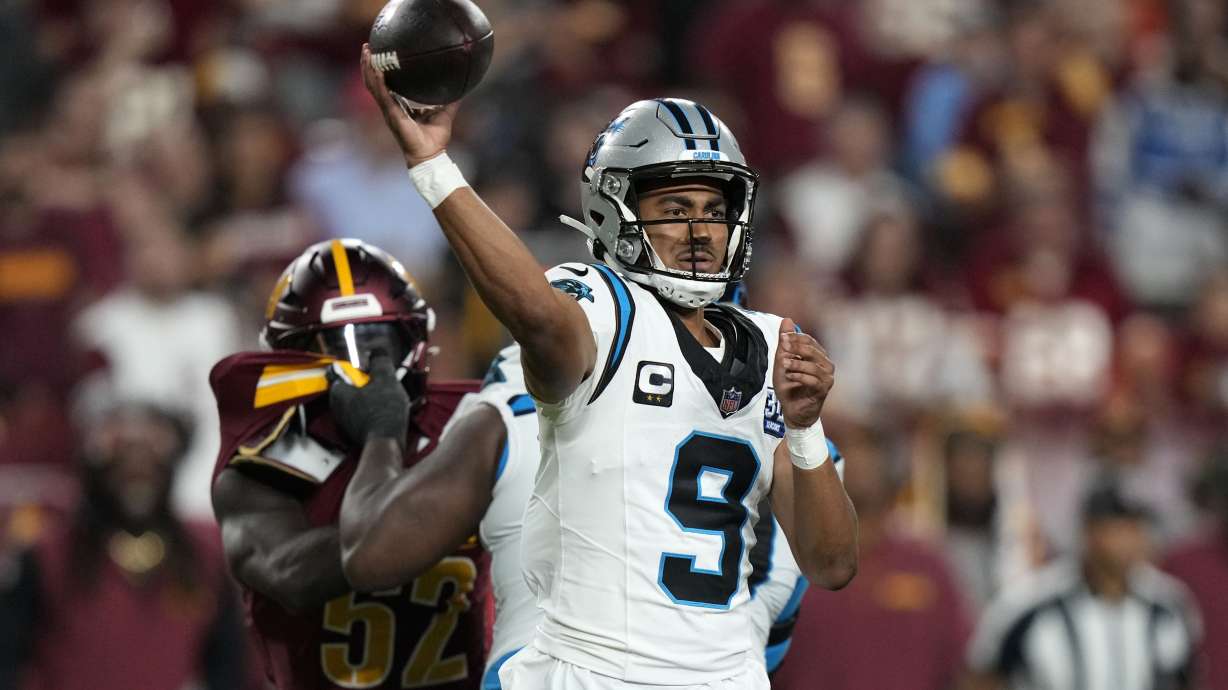Carolina Panthers quarterback Bryce Young throws a pass during the second half of an NFL football game against the Washington Commanders, Sunday, Oct. 20, 2024, in Landover, Md.