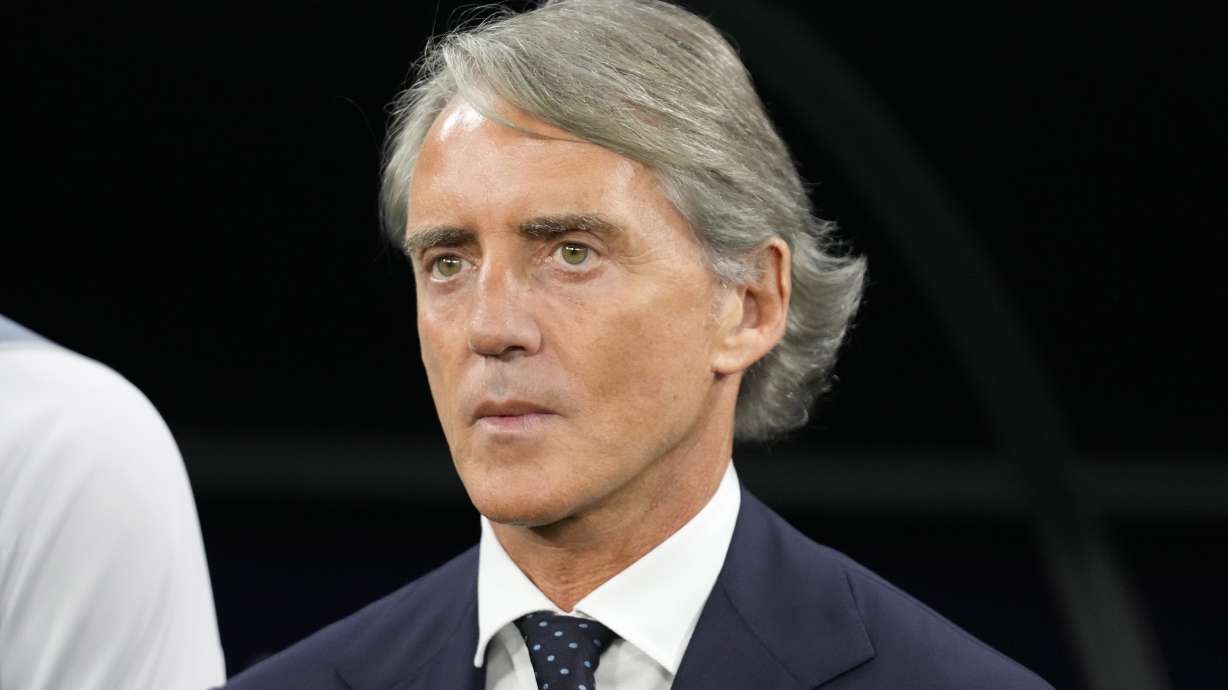 FILE - WSaudi Arabia's head coach Roberto Mancini stands for the national anthem ahead of the Asian Cup Group F soccer match between Kyrgyzstan and Saudi Arabia at Ahmad Bin Ali Stadium, in Doha, Qatar, Jan. 21, 2024.