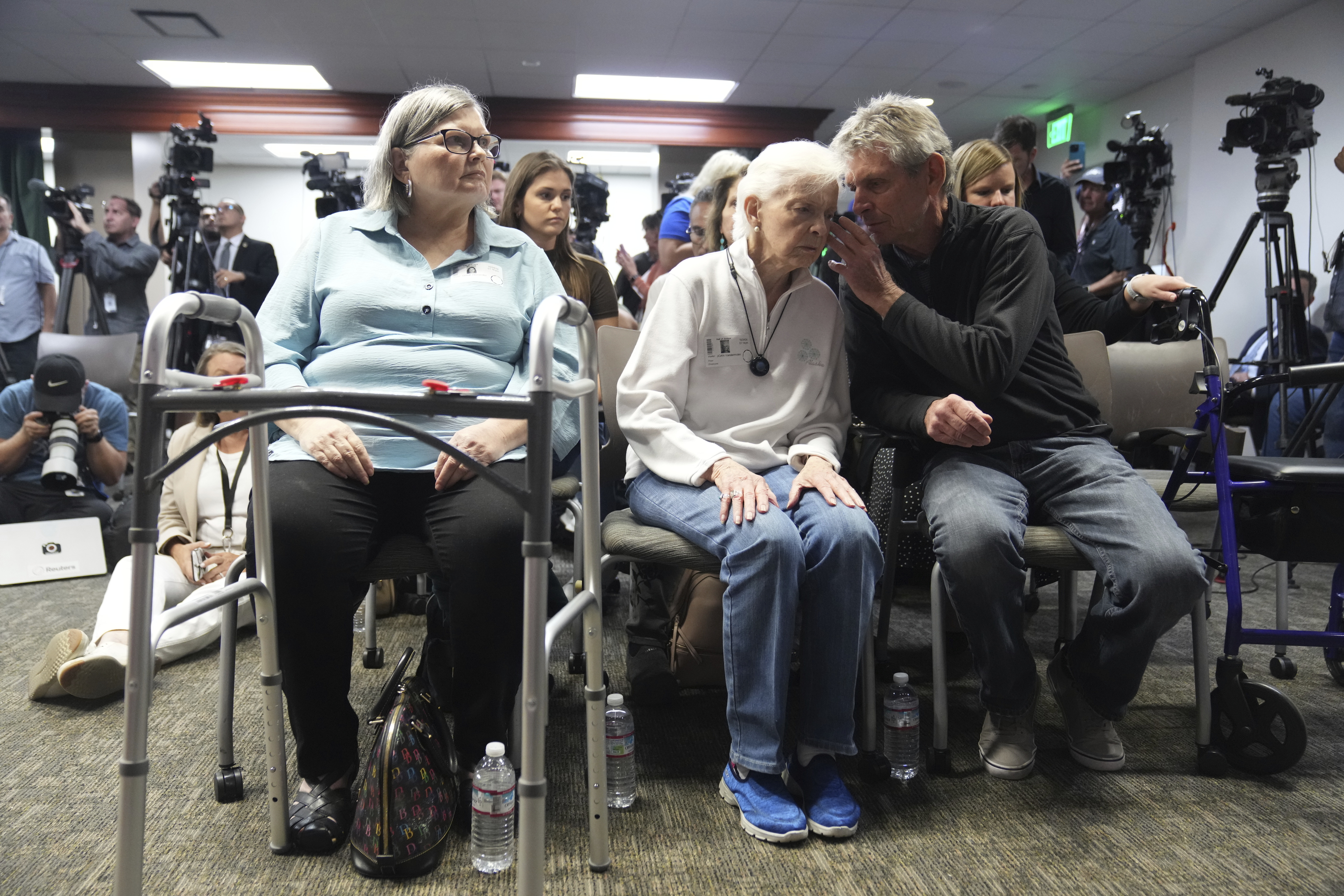 Arnold VanderMolen, Nephew of Kitty Menendez, right, talks with Kitty Menendez's sister, Joan Andersen VanderMolen at a news conference being held by Los Angeles County District Attorney George Gascon on Thursday, Oct. 24, 2024, in Los Angeles.