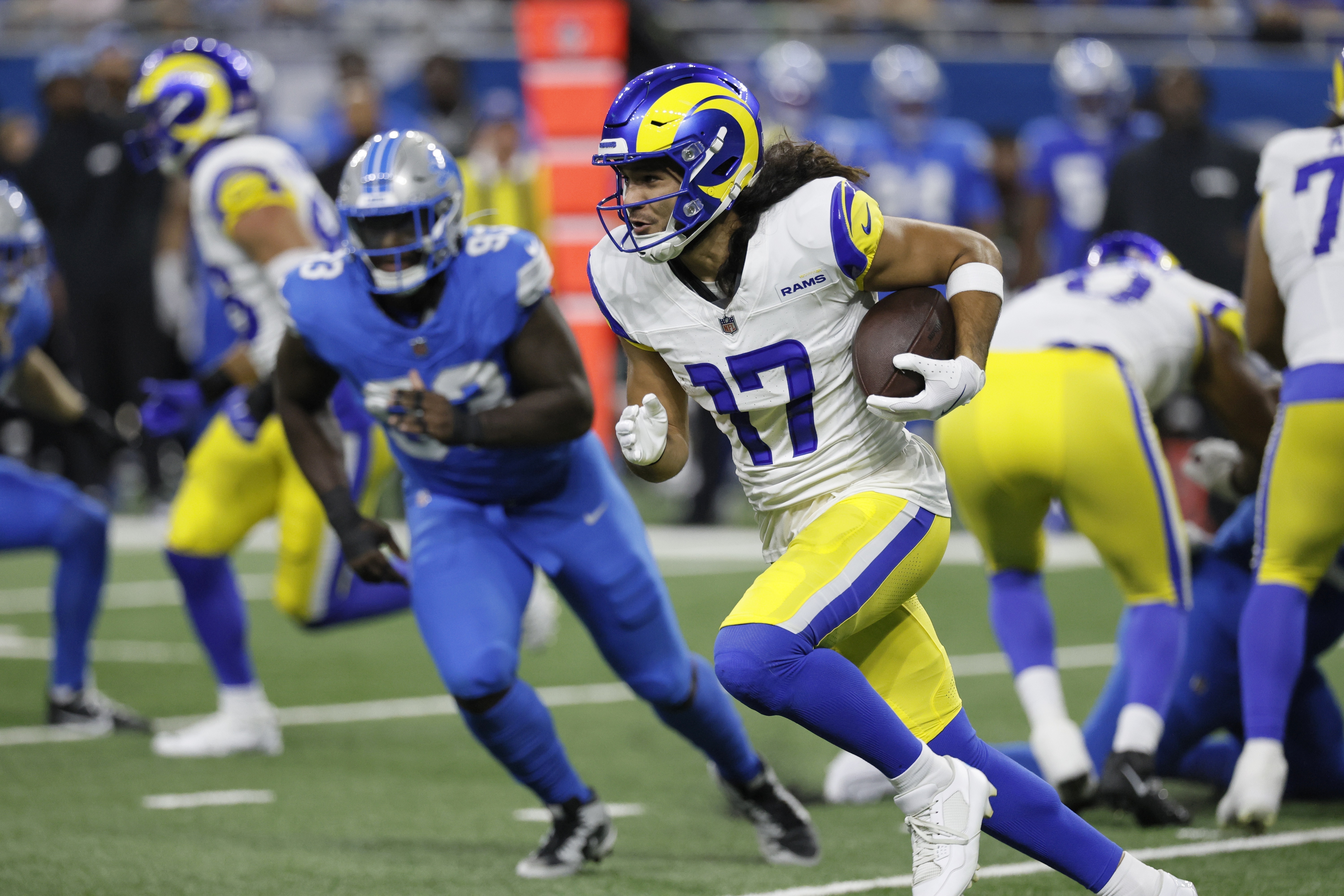FILE -Los Angeles Rams wide receiver Puka Nacua (17) carries the ball against the Detroit Lions during the first half of an NFL football game Sunday, Sept. 8, 2024, in Detroit.