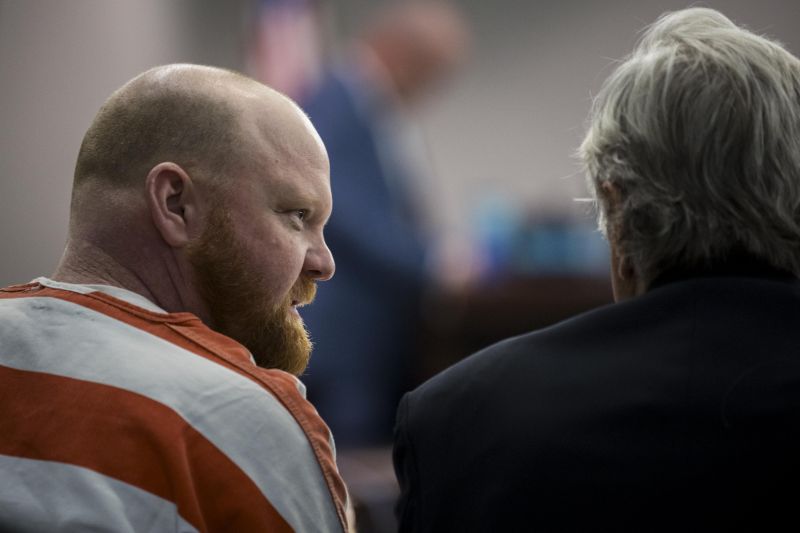 Travis McMichael speaks with his attorney during a hearing challenging his conviction of killing Ahmaud Arbery in 2020, Thursday, in Brunswick, Ga.