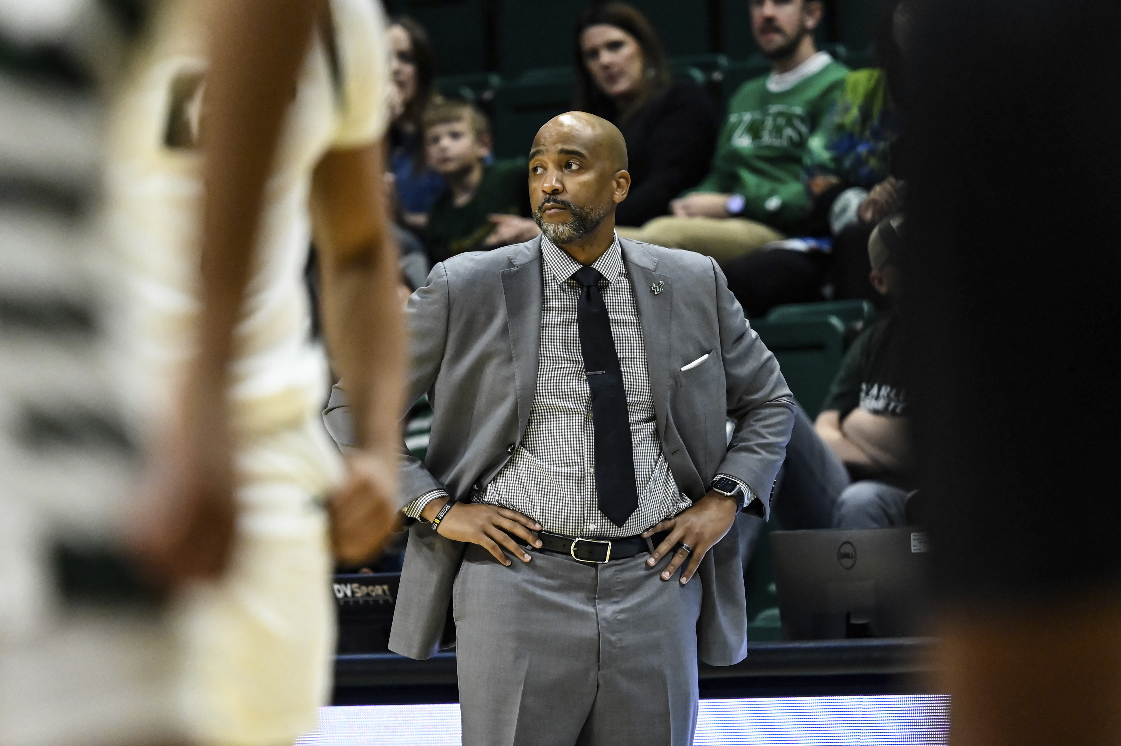 FILE - South Florida head coach Amir Abdur-Rahim looks on during the first half of an NCAA college basketball game against Charlotte, March 2, 2024, in Charlotte, N.C.