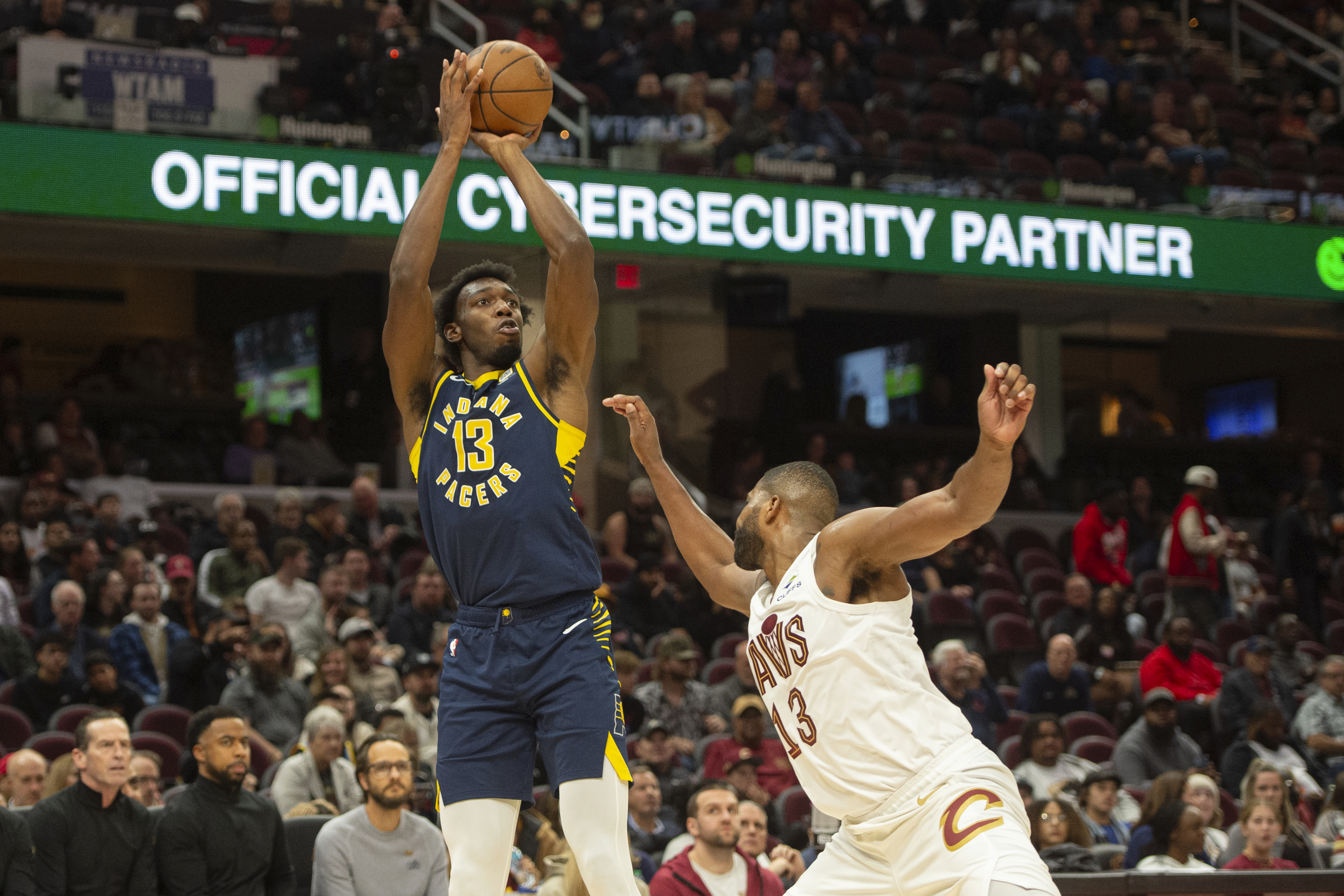 Indiana Pacers' James Wiseman (13) shoots over Cleveland Cavaliers' Tristan Thompson (13) during the second half of a preseason NBA basketball game in Cleveland, Thursday, Oct. 10, 2024. 
