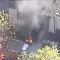 Woman in critical condition, 7 others injured in Holladay house fire