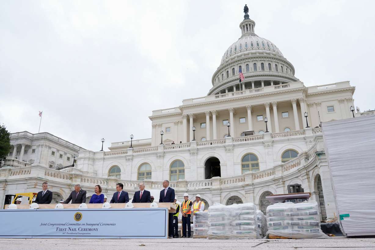 Congress members hammer in the first nails at the First Nail Ceremony marking the beginning of construction of the 2025 Presidential Inauguration platform on the steps of the Capitol, Sept. 18, in Washington.