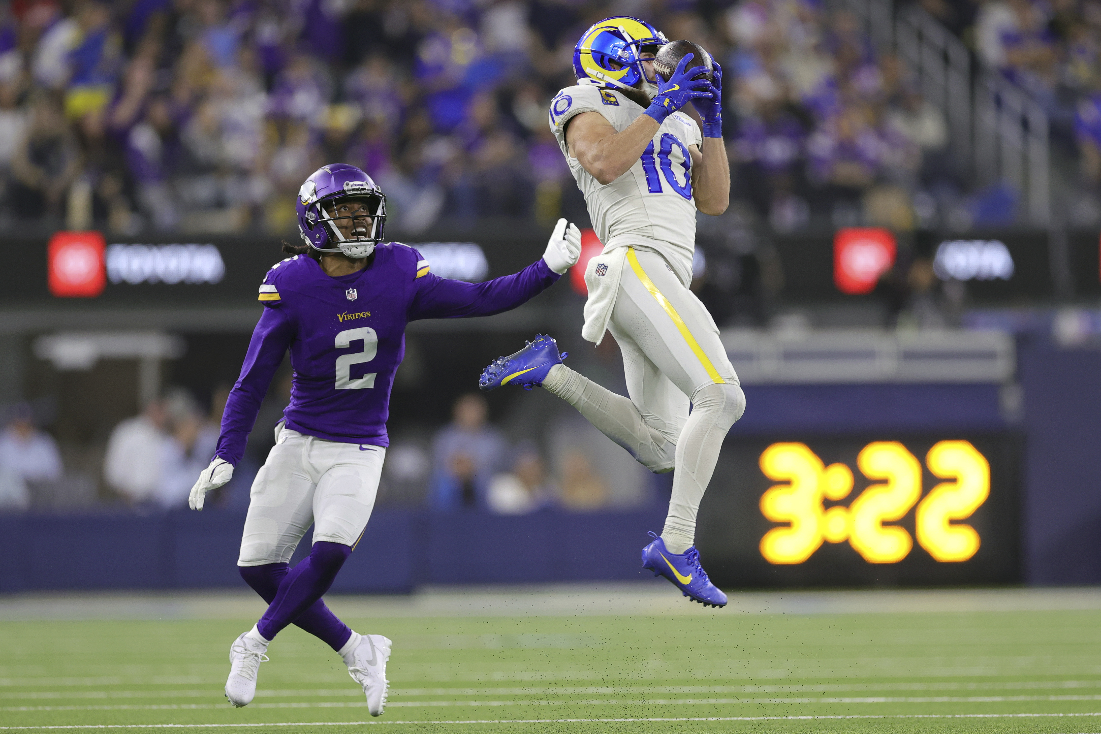 Los Angeles Rams wide receiver Cooper Kupp (10) catches a pass against Minnesota Vikings cornerback Stephon Gilmore (2) during the second half of an NFL football game, Thursday, Oct. 24, 2024, in Inglewood, Calif.