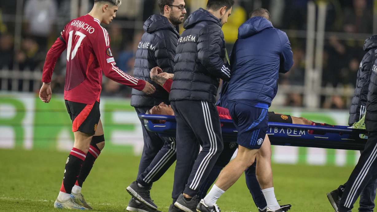Manchester United's Antony is carrying out the pitch injured in a stretcher during the Europa League opening phase soccer match between Fenerbahce and Manchester United at Sukru Saracoglu stadium, in Istanbul, Turkey, Thursday, Oct. 24, 2024.