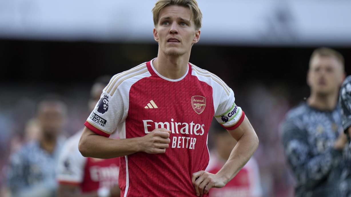 FILE - Arsenal's Martin Odegaard reacts at the end of the English Premier League soccer match between Arsenal and Everton at the Emirates stadium in London, Sunday, May 19, 2024.