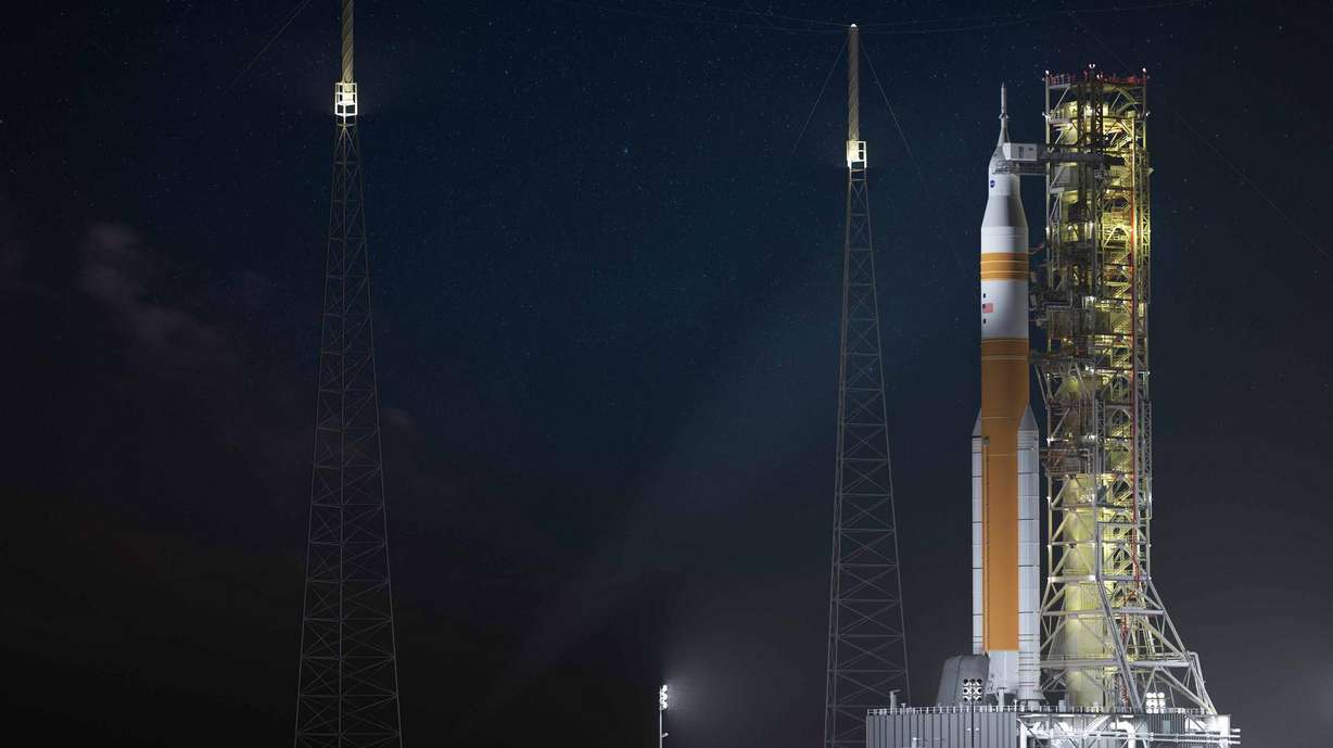 A photo of Artemis I Orion. The spacecraft flew seeds on its flight. Upon return, NASA and the U.S. Forest Service grew saplings from the seeds and gave them to some U.S. schools. Neil Armstrong Academy in West Valley City received one of the saplings on Monday and planted it on Friday.