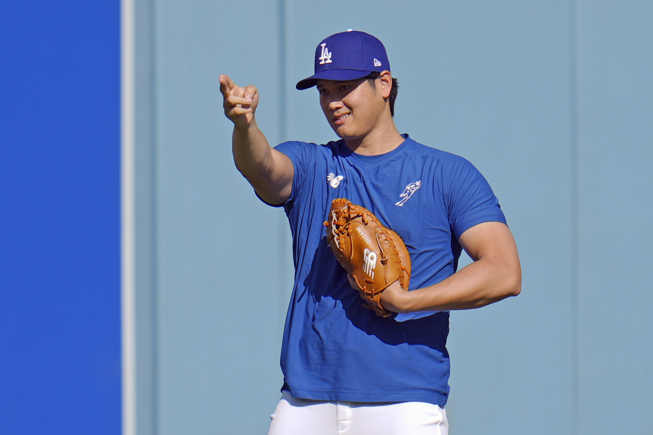 Los Angeles Dodgers Shohei Ohtani gestures during batting practice before Game 1 of the baseball World Series, Friday, Oct. 25, 2024, in Los Angeles. 