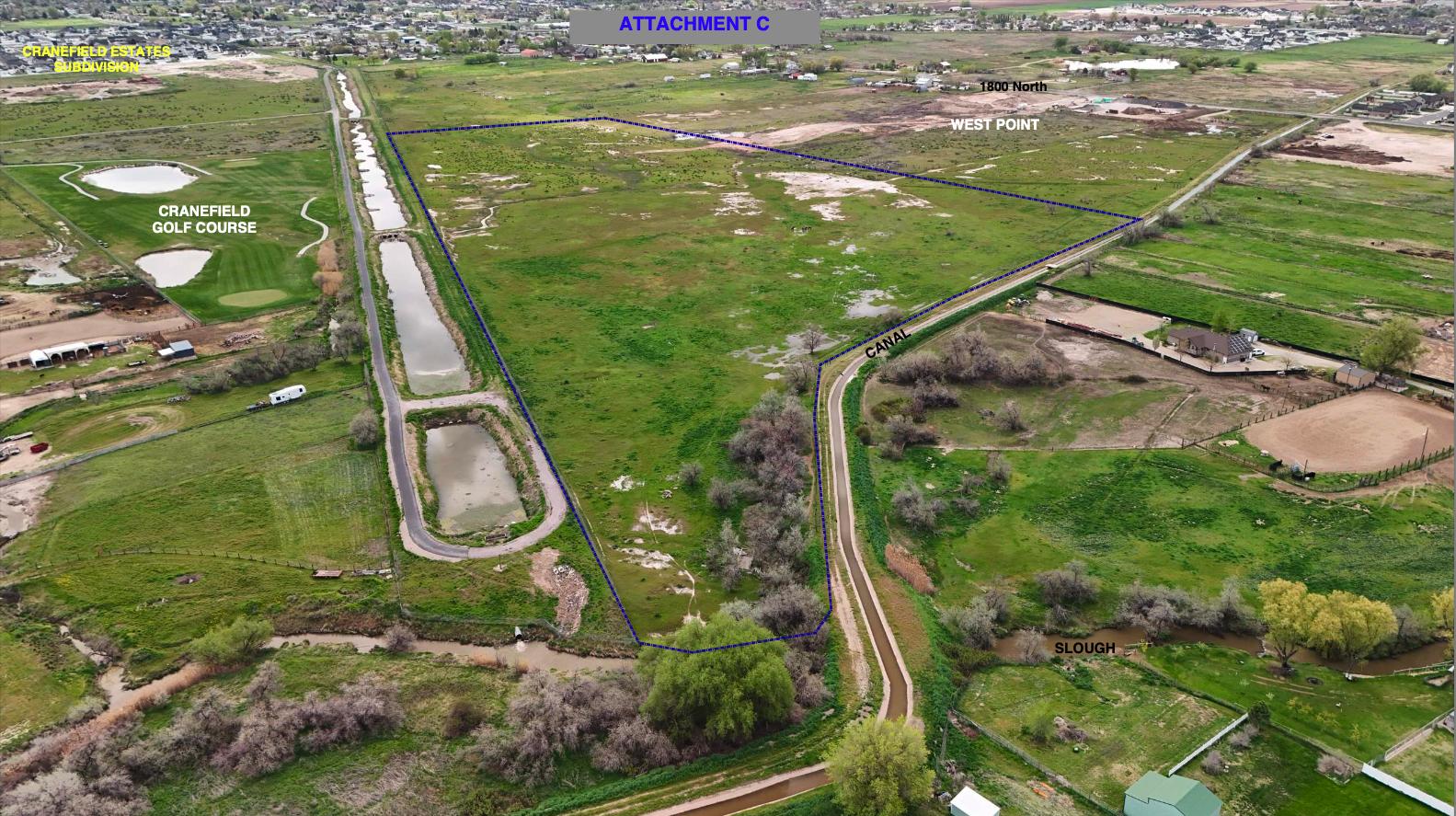 An aerial photo, looking to the southeast, of the site of a proposed housing development in Clinton that has sparked controversy. The right side of the photo shows part of West Point.