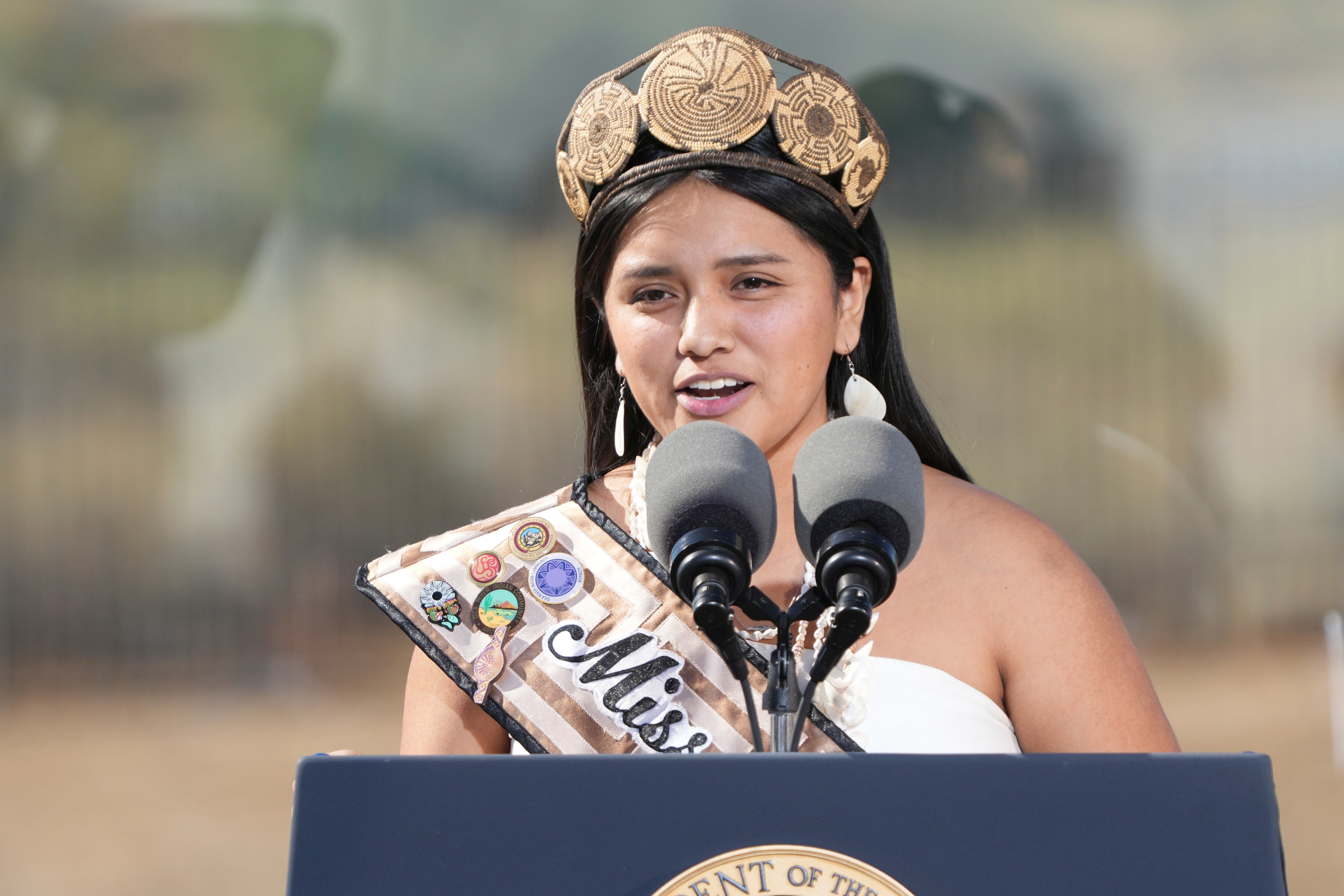Miss Gila River 2024-25 Susanna Osife speaks at the Gila Crossing Community School supporting President Joe Biden, Friday, in Laveen, Ariz.