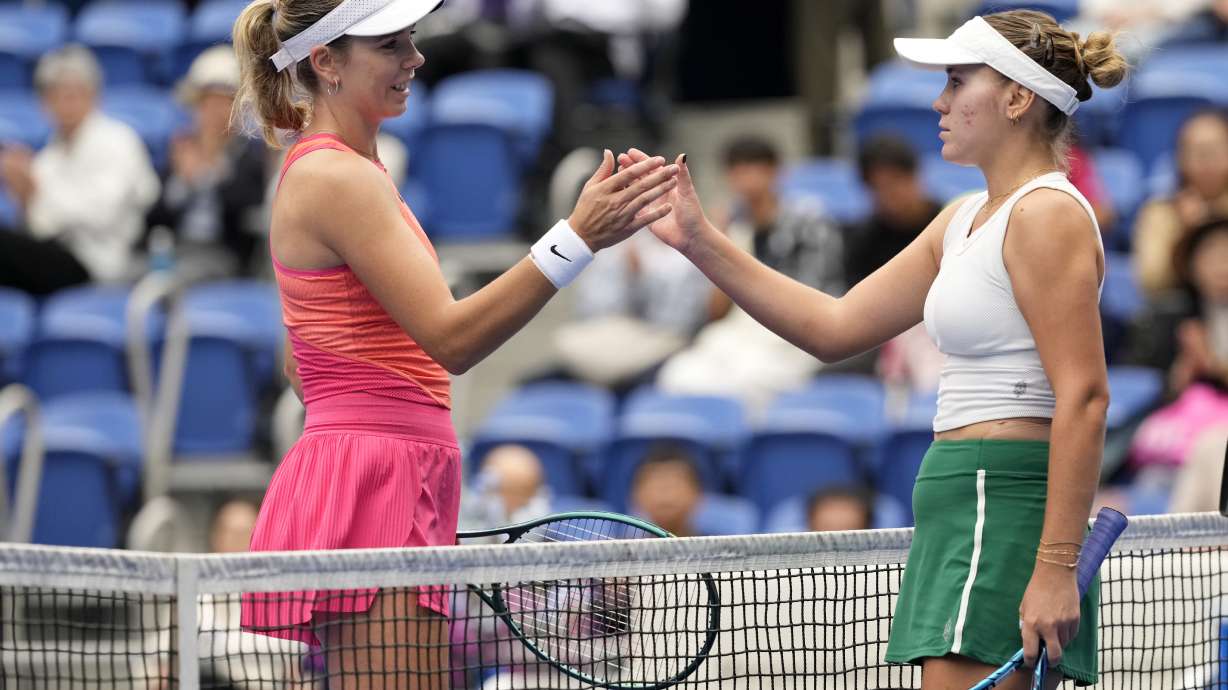 Sofia Kenin of the United States, right, and Britain's Katie Boulter greet each other after Sofia won the semifinal match of the Pan Pacific Open women's tennis tournament at Ariake Coliseum, in Tokyo, Saturday, Oct. 26, 2024.