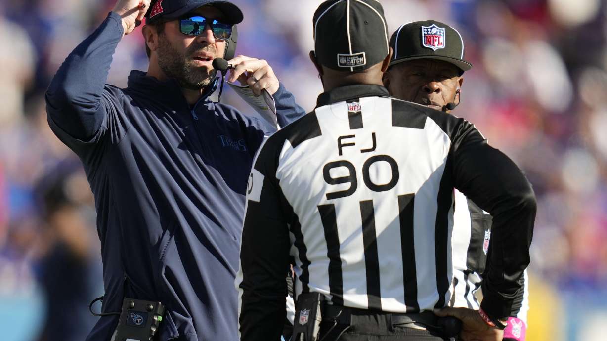 Tennessee Titans head coach Brian Callahan talks to officials during the second half of an NFL football game against the Buffalo Bills, Sunday, Oct. 20, 2024, in Orchard Park, N.Y.