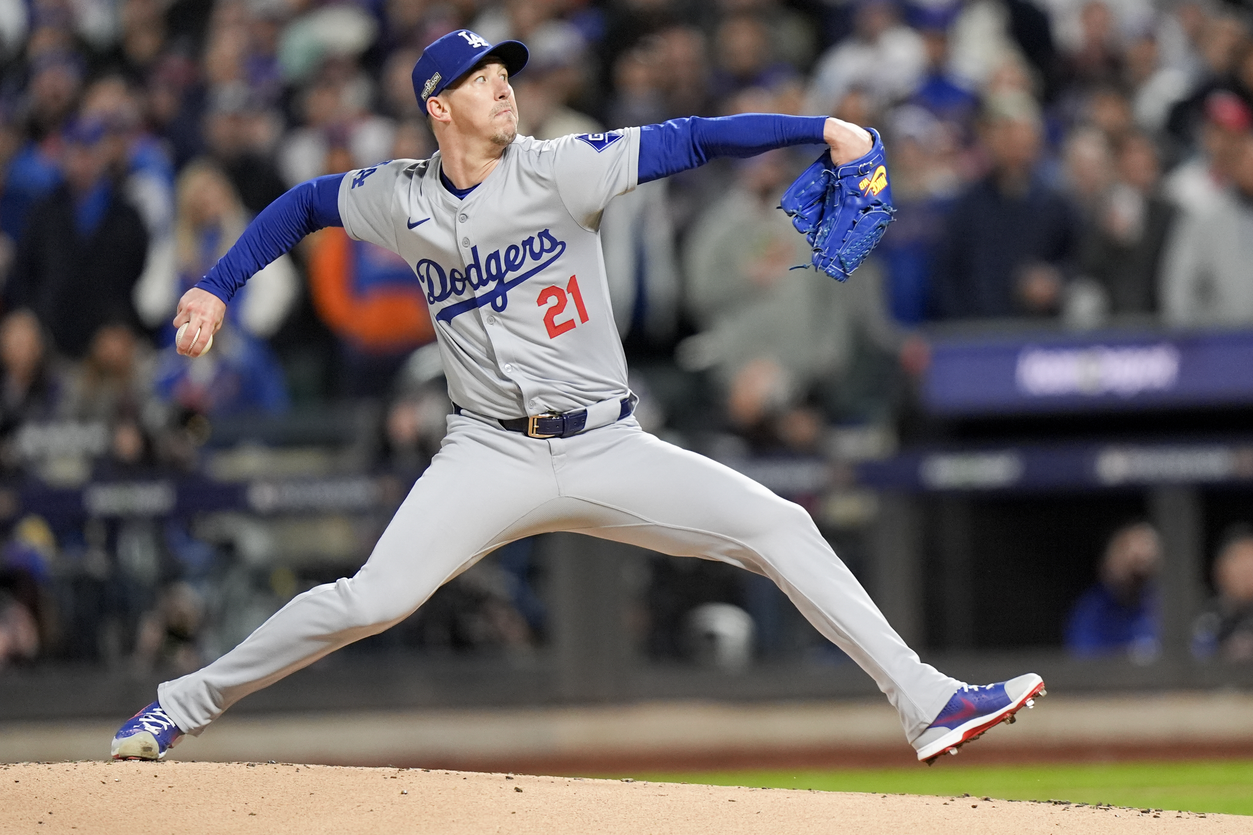 Los Angeles Dodgers pitcher Walker Buehler throws against the New York Mets during the first inning in Game 3 of a baseball NL Championship Series, Wednesday, Oct. 16, 2024, in New York.
