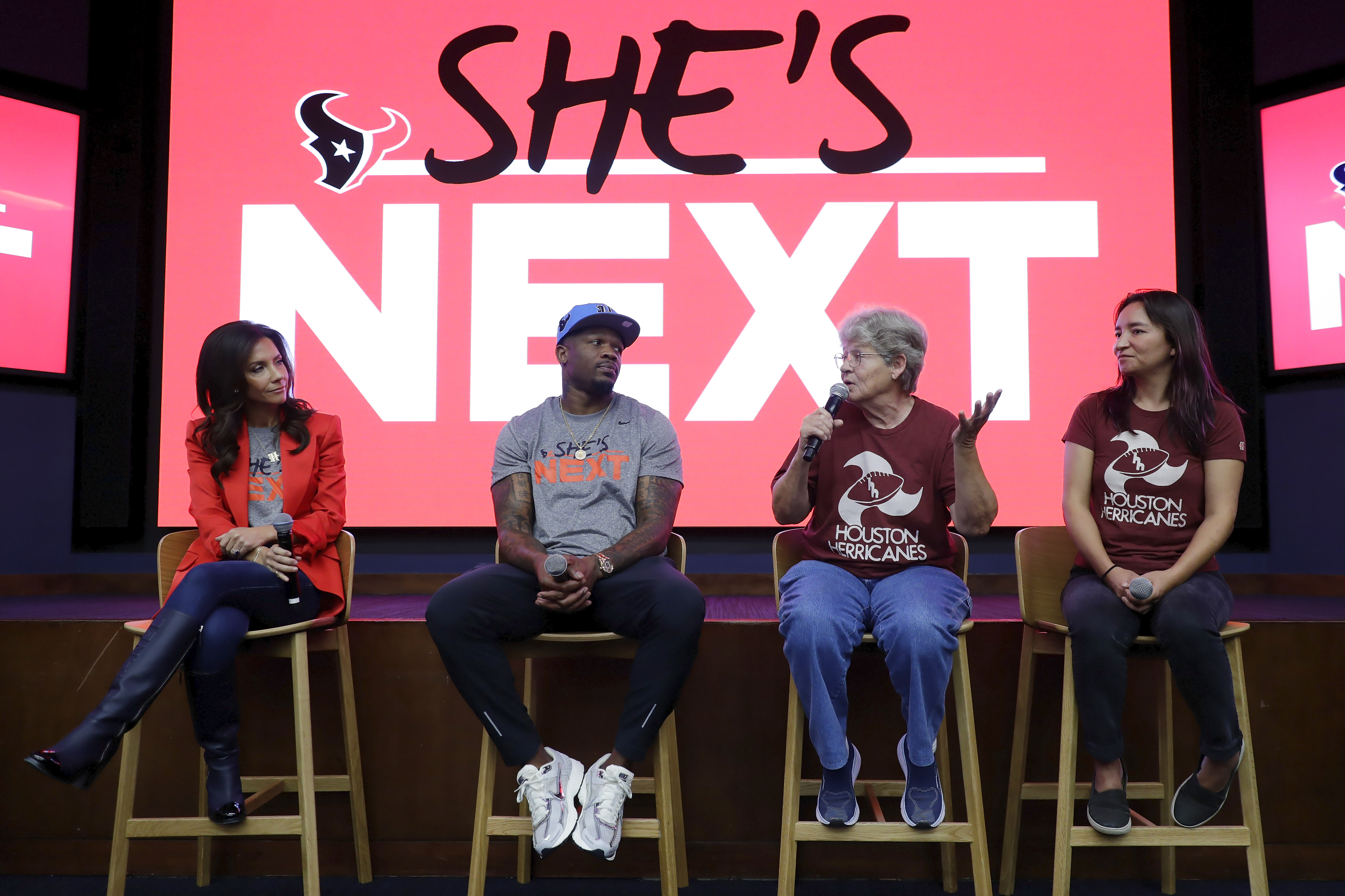 Panel members, from left, Hannah McNair, Texans co-owner; Andre Johnson, former Texan and NFL Hall-of-Famer; Marty Bryant, former Houston Herricanes player; and Olivia Kuan, director and producer, speak after an exclusive screening of the documentary "The Herricanes", about the Houston full-tackle women's football league team in the 70s, shown at NRG stadium Saturday, {monthname3.} 26, 2024, in Houston. The Texans NFL team hosted the event with players from the era along with Texans legend players and current high school girls flag football players. 