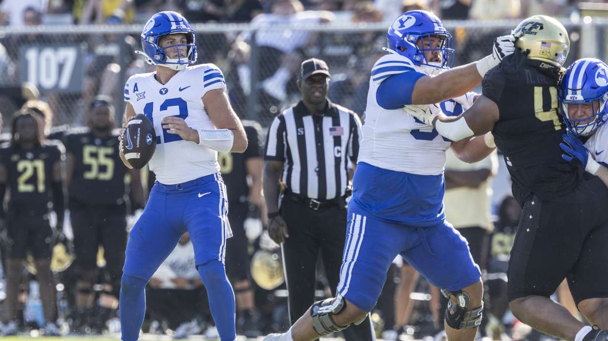 BYU quarterback Jake Retzlaff drops back into pocket against Central Florida during the first half of an NCAA college football game, Saturday, Oct. 26, 2024, in Orlando, Fla.