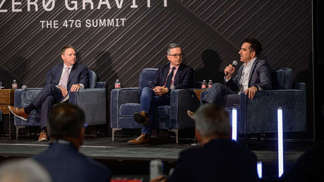 Panelists Matt Pottinger, Rupert Hammond-Chambers and Ylli Bajraktari speak during the Zero Gravity Summit in Salt Lake City on Thursday.
