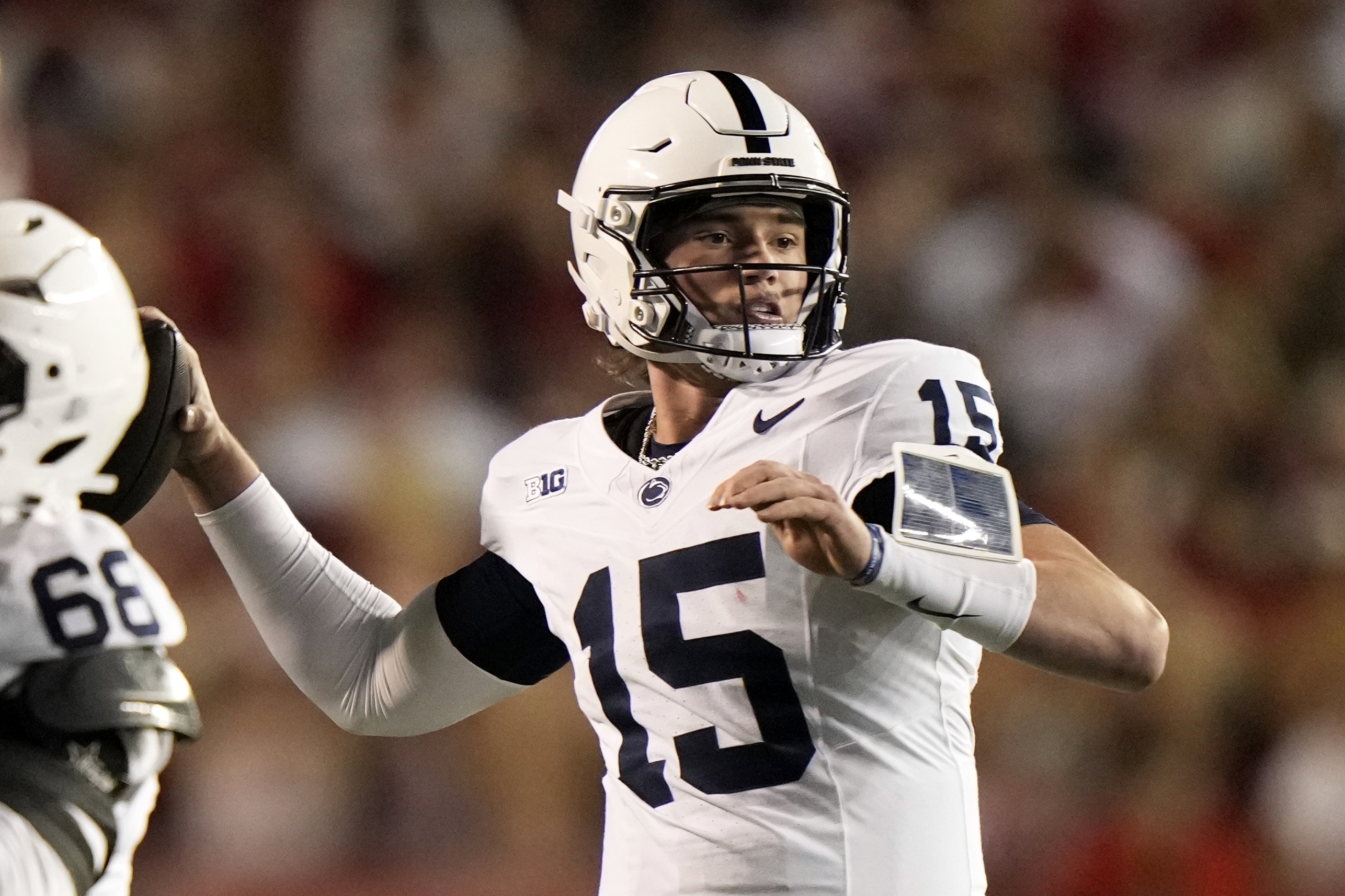 Penn State's Drew Allar (15) throws during the first half of an NCAA college football game against the WisconsinSaturday, Oct. 26, 2024, in Madison, Wis.