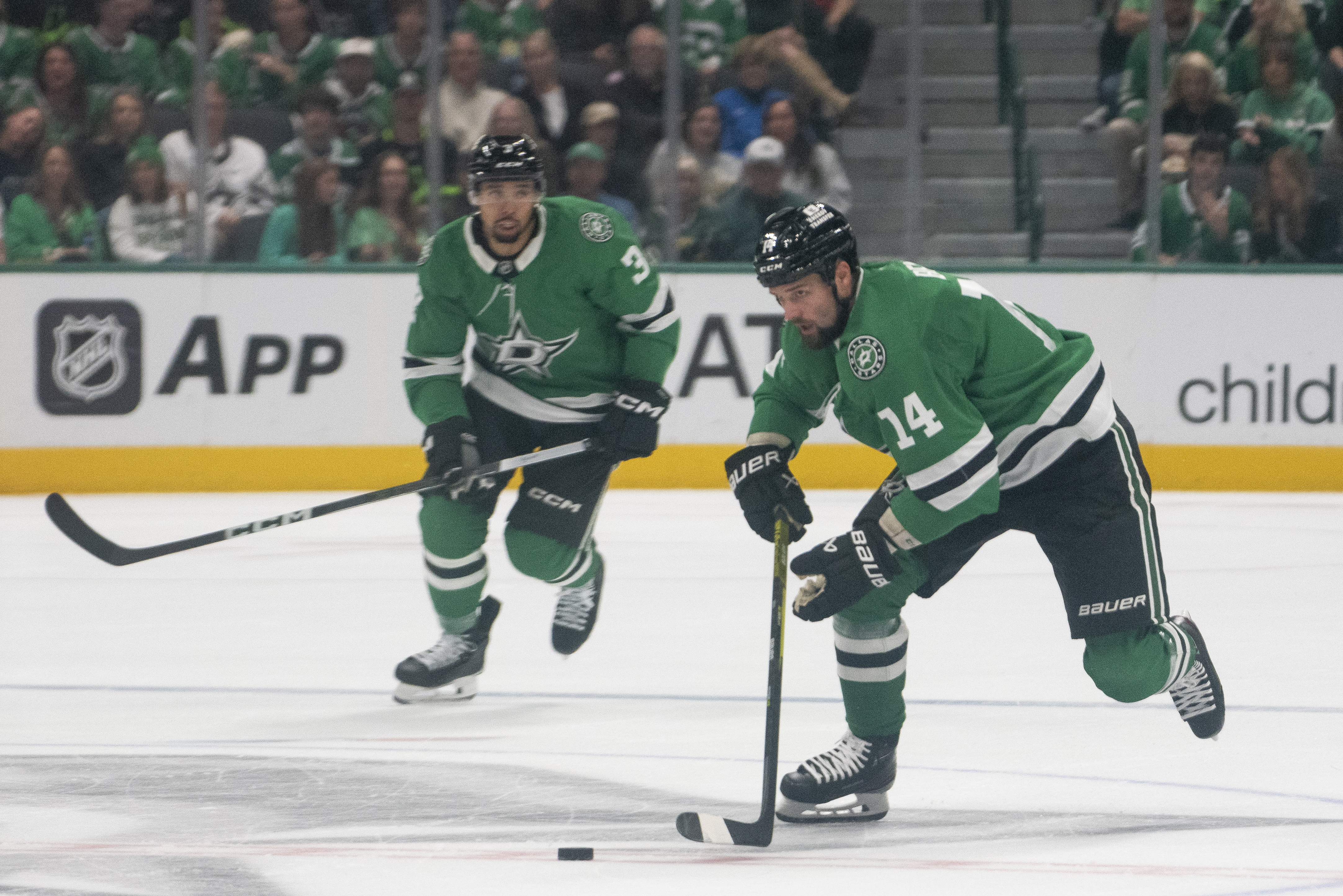 Dallas Stars left wing Jamie Benn (14) gains possession of the puck during the first period of an NHL hockey game against the Chicago Blackhawks, Saturday, Oct. 26, 2024, in Dallas. 