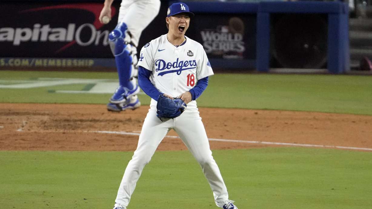Los Angeles Dodgers starting pitcher Yoshinobu Yamamoto (18) reacts after striking out New York Yankees' Anthony Rizzo during the fourth inning in Game 2 of the baseball World Series, Saturday, Oct. 26, 2024, in Los Angeles.