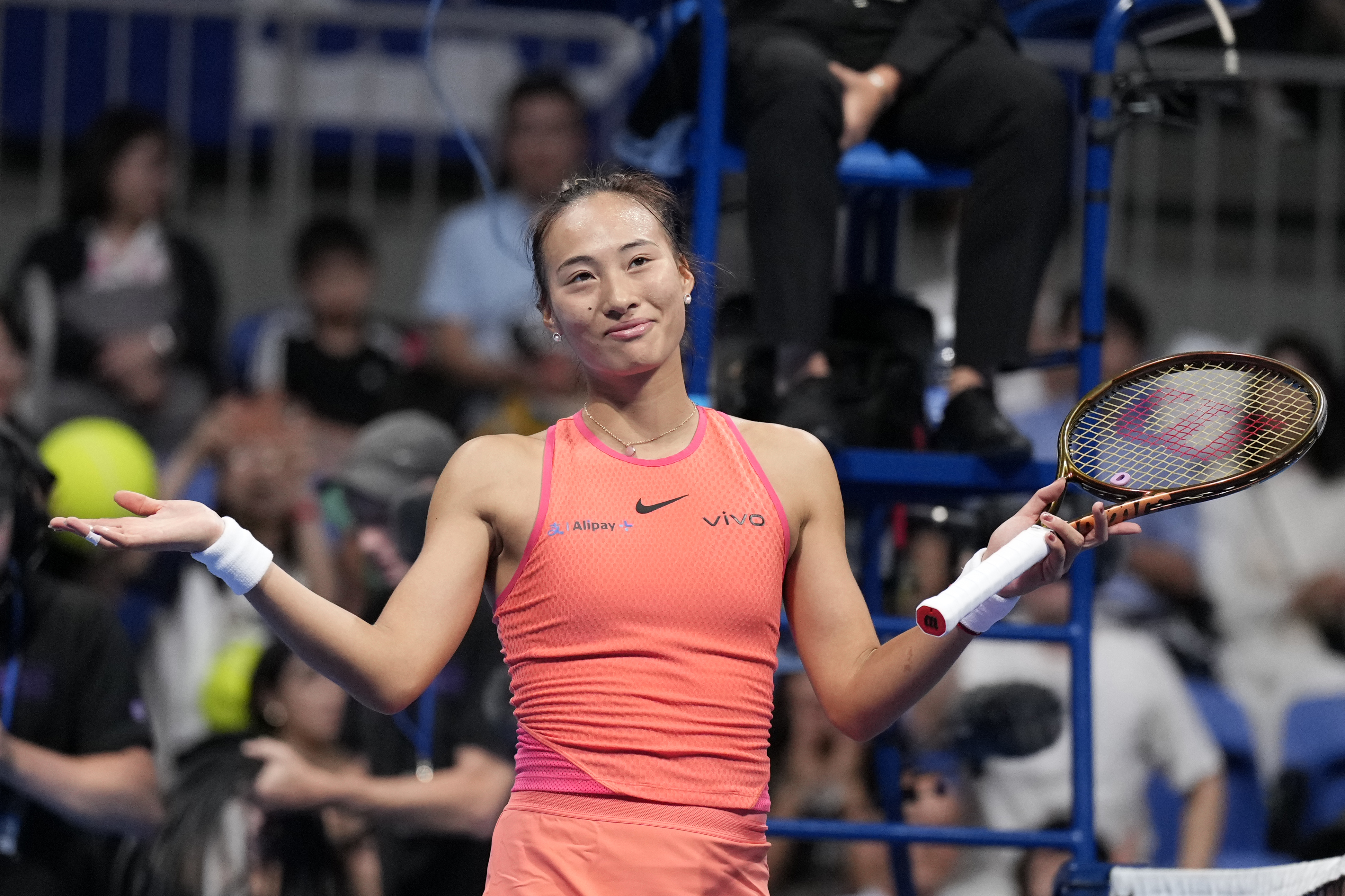 China's Zheng Qinwen gestures after winning against Sofia Kenin of the United States in the final match of the Pan Pacific Open women's tennis tournament at Ariake Coliseum, in Tokyo, Sunday, Oct. 27, 2024. 