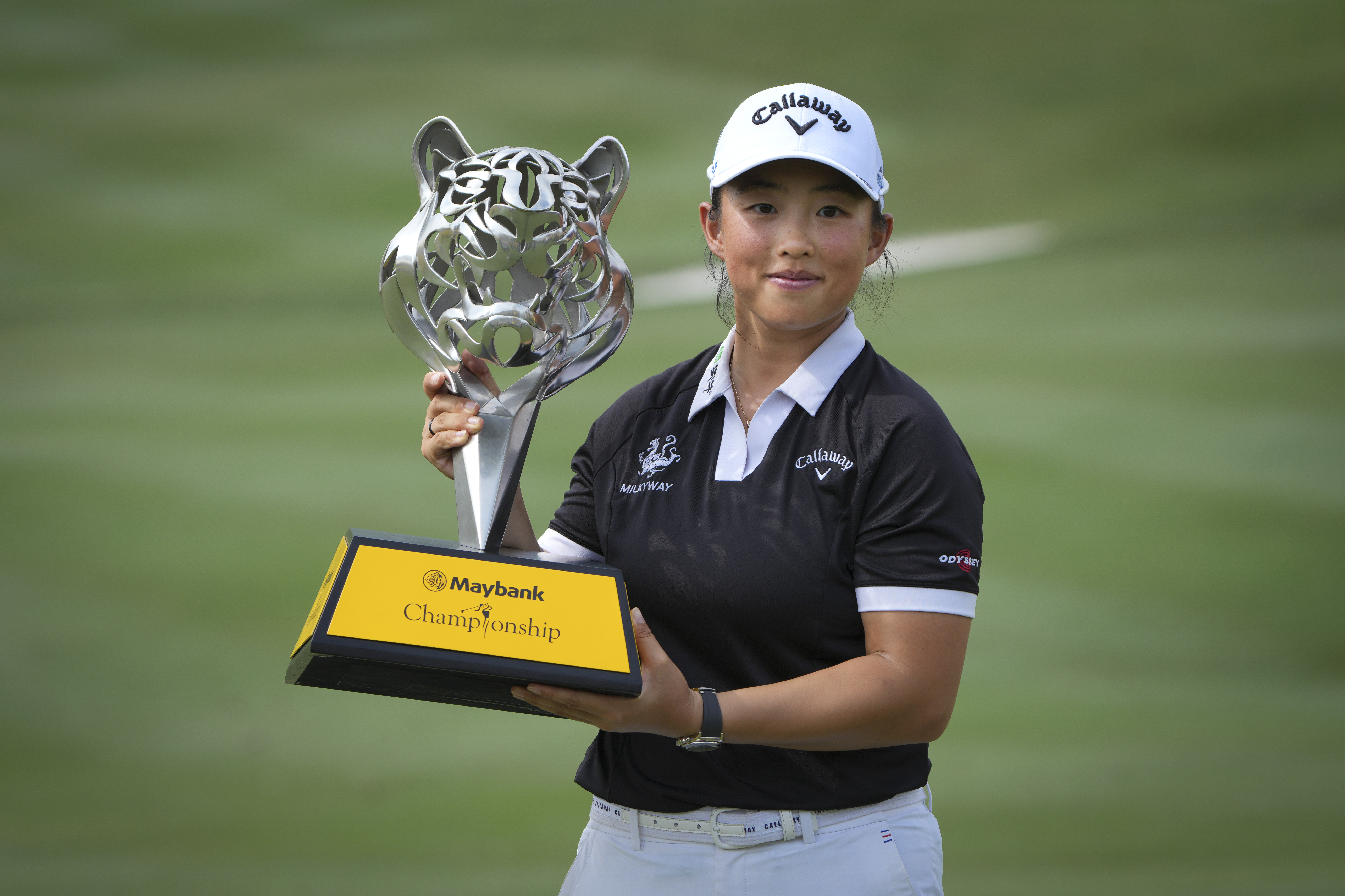 Yin Ruoning of China holds the winning trophy during the awards ceremony after winning the LPGA Tour's Maybank Championship at Kuala Lumpur Golf and Country club in Kuala Lumpur, Sunday, Oct. 27, 2024. 