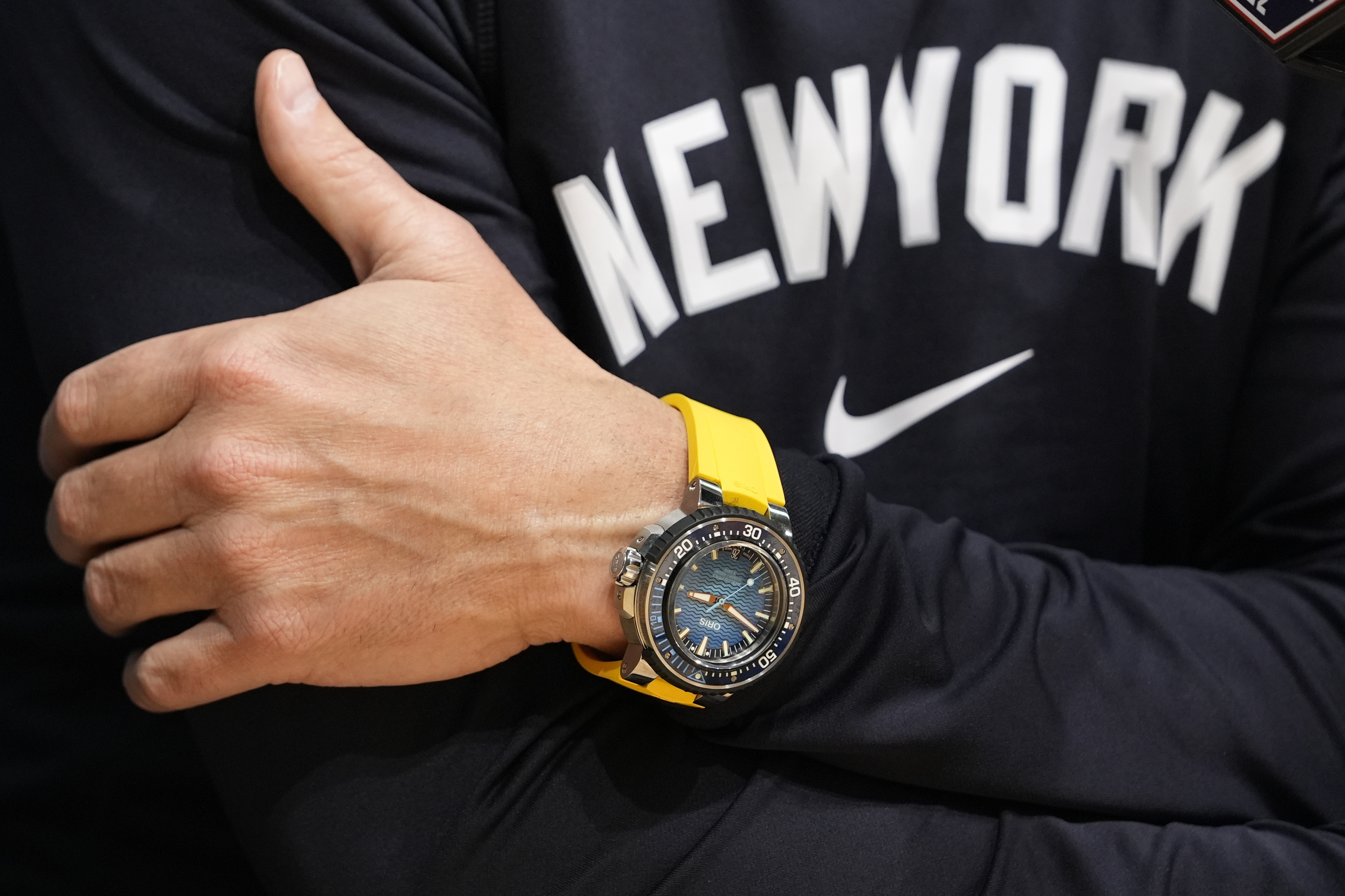 New York Yankees manager Aaron Boone wears one of his many wrist watches during a news conference before Game 2 of the baseball World Series, Saturday, Oct. 26, 2024, in Los Angeles.