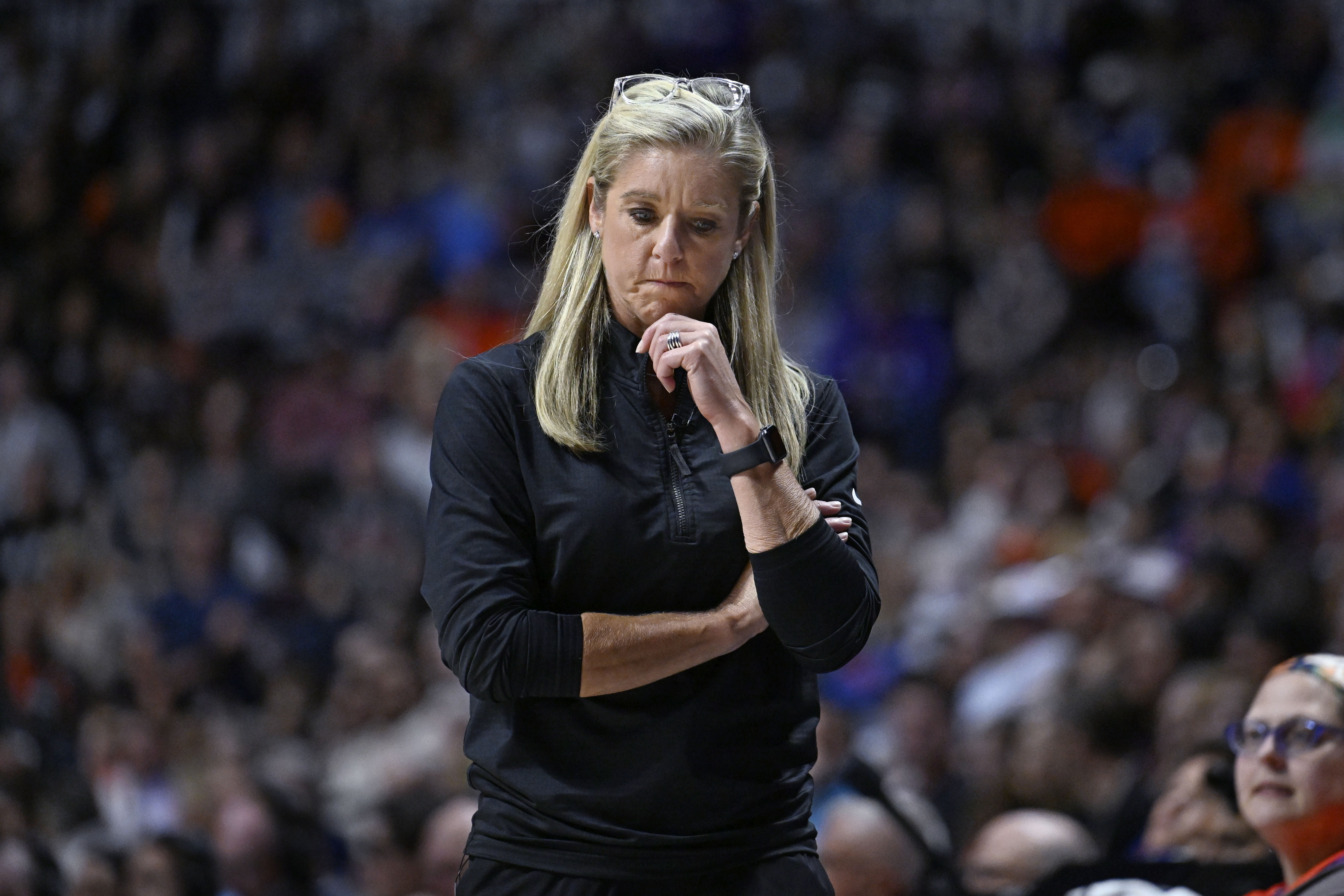 FILE - Indiana Fever head coach Christie Sides reacts during Game 2 of a first-round WNBA basketball playoff series against the Connecticut Sun, Sept. 25, 2024, in Uncasville, Conn. 