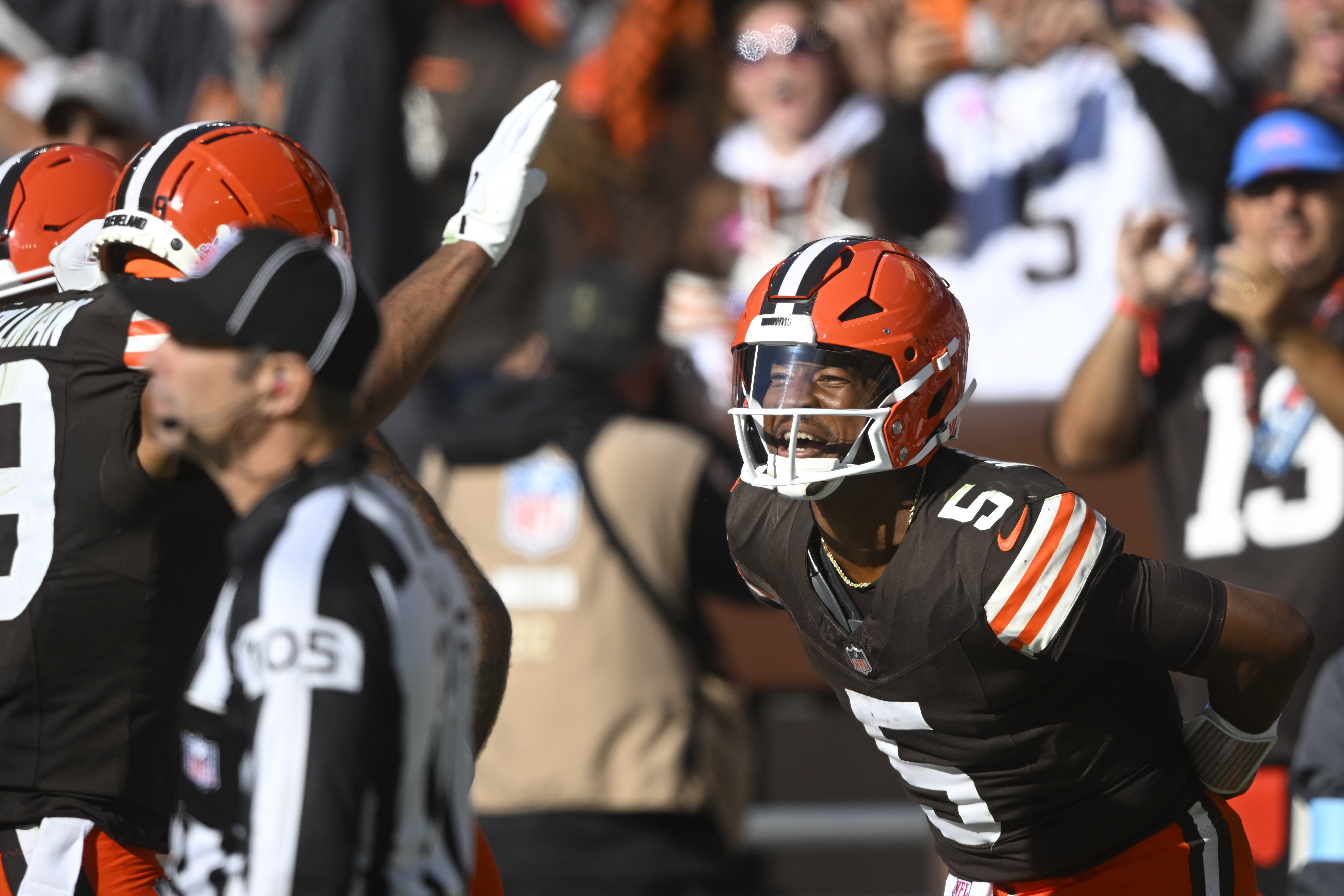 Cleveland Browns quarterback Jameis Winston (5) celebrates a touchdown pass to wide receiver Cedric Tillman (19) against the Baltimore Ravens during the second half of an NFL football game in Cleveland, Sunday, Oct. 27, 2024. 