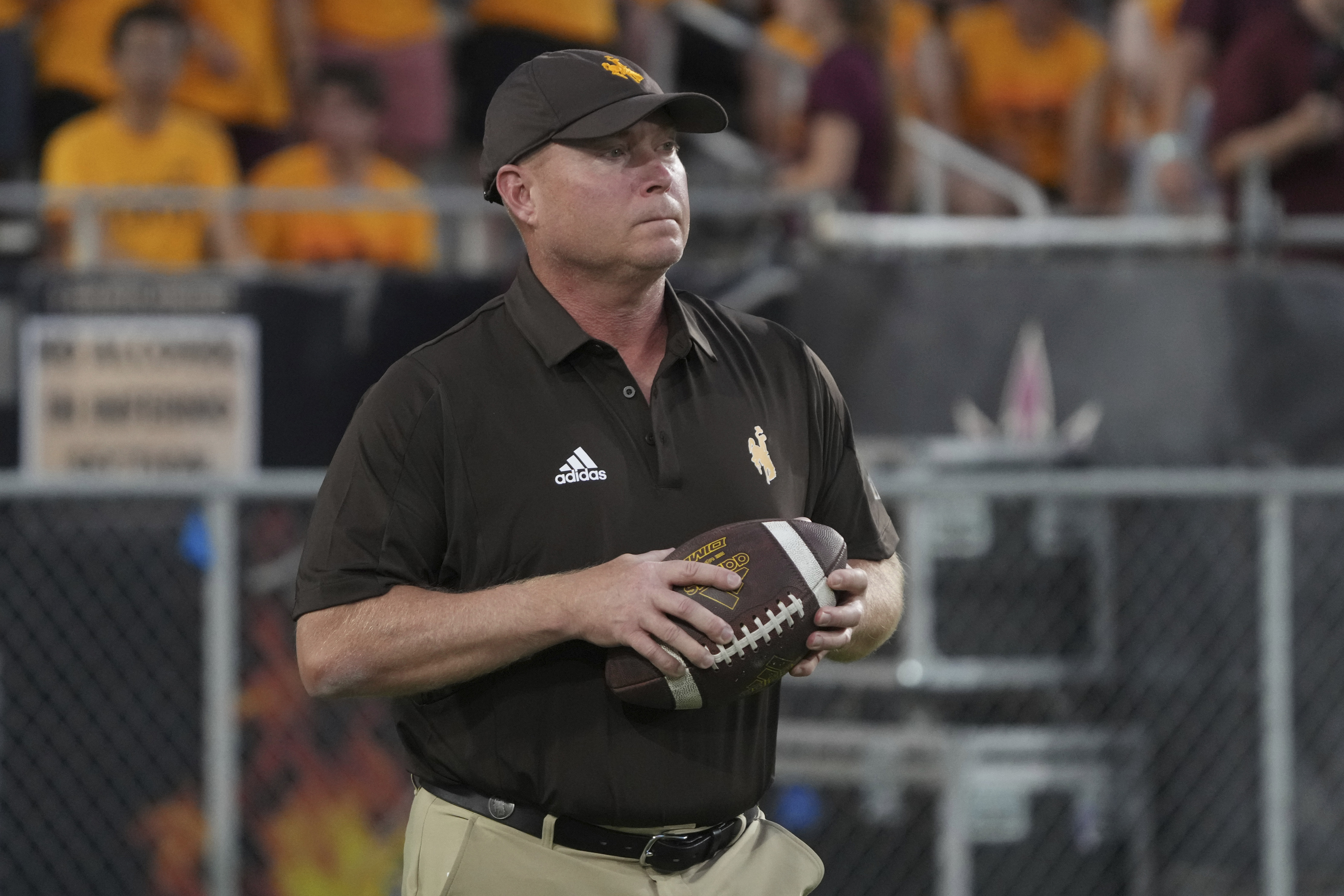 FILE - Wyoming head coach Jay Sawvel looks on before an NCAA football game against Arizona State on Saturday, Aug. 31, 2024, in Tempe, Ariz.