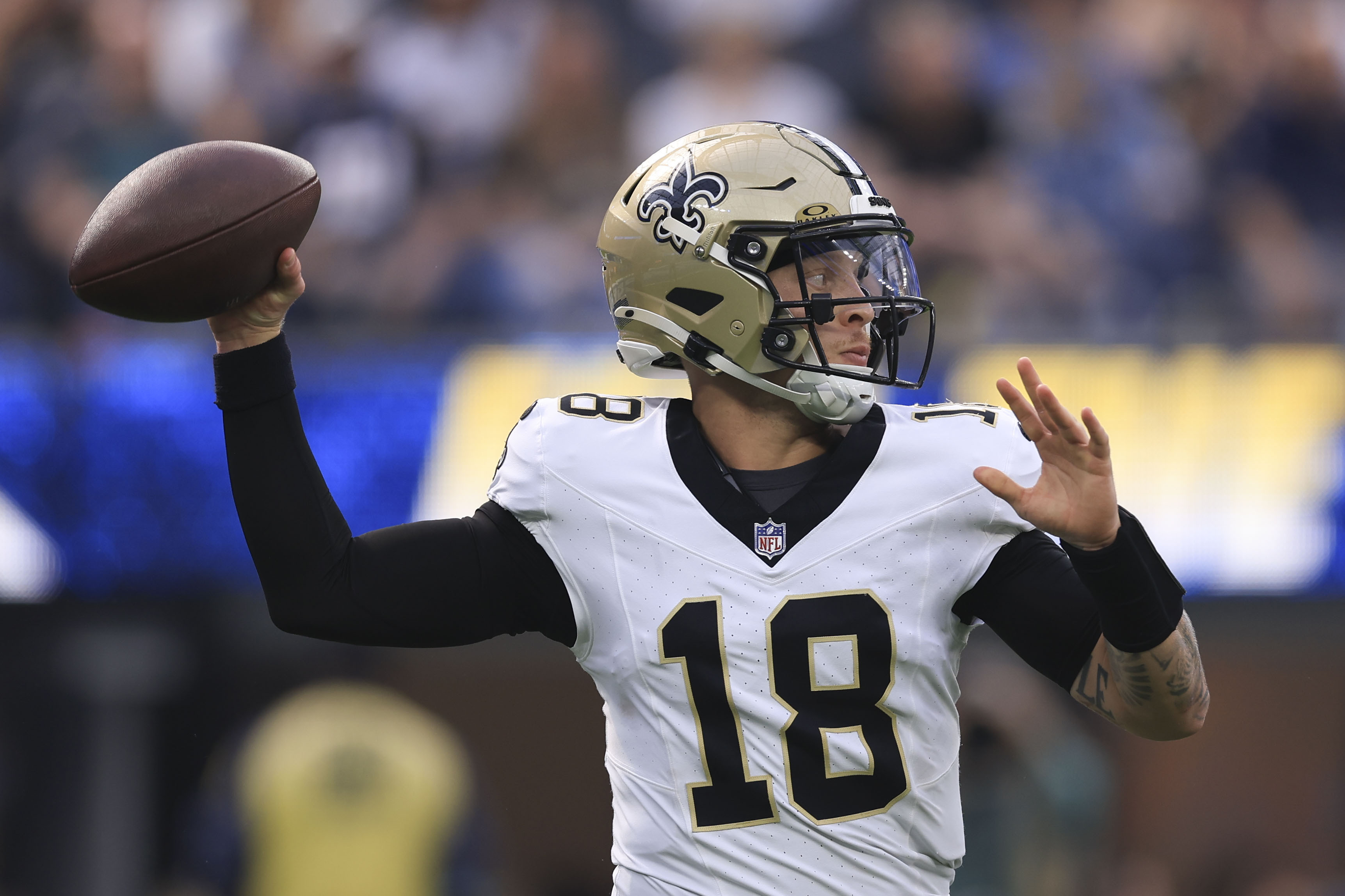 New Orleans Saints quarterback Spencer Rattler (18) passes in the first half of an NFL football game against the Los Angeles Chargers in Inglewood, Calif., Sunday, Oct. 27, 2024. 