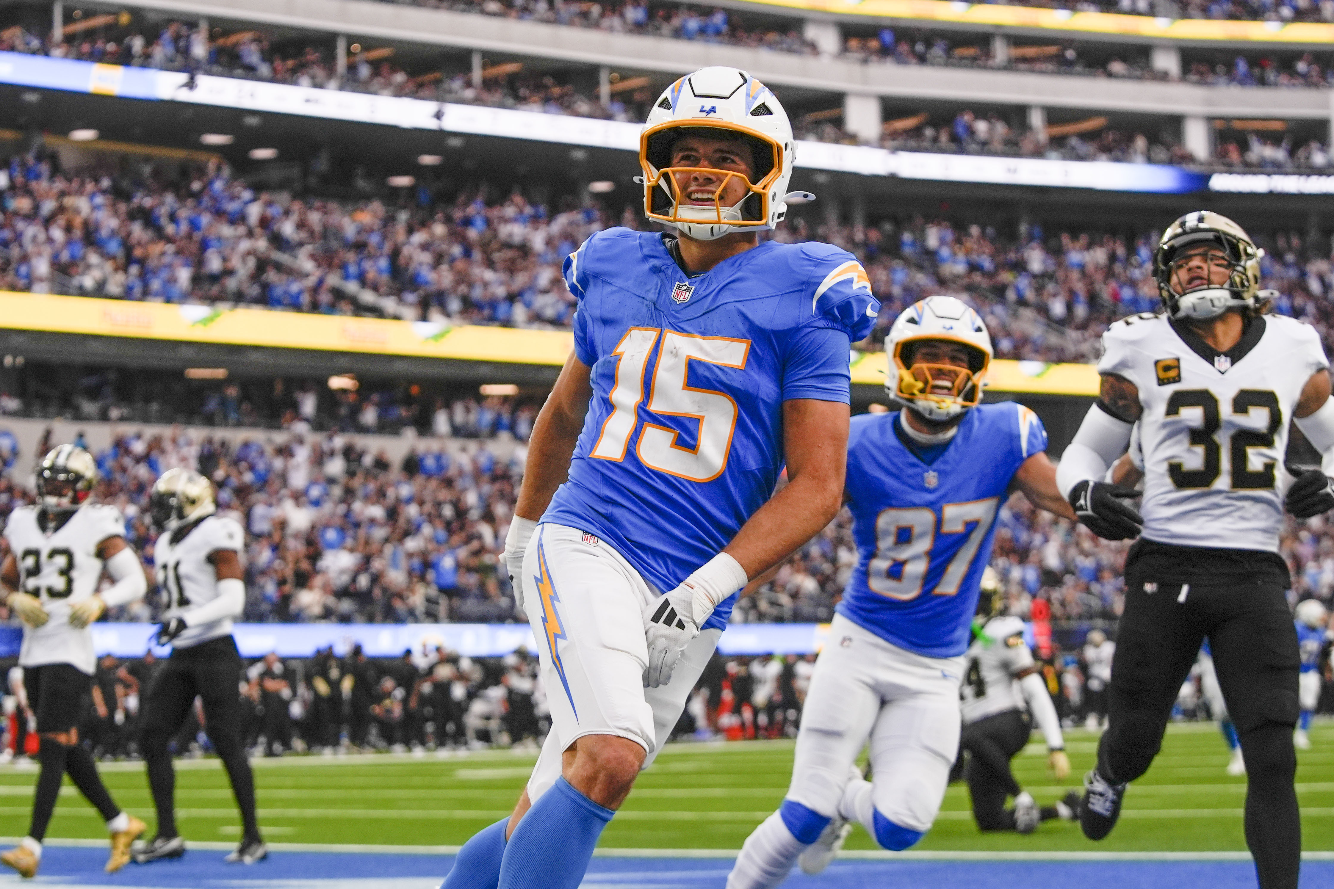 Los Angeles Chargers wide receiver Ladd McConkey (15) celebrates his touchdown reception in the second half of an NFL football game against the New Orleans Saints in Inglewood, Calif., Sunday, Oct. 27, 2024.