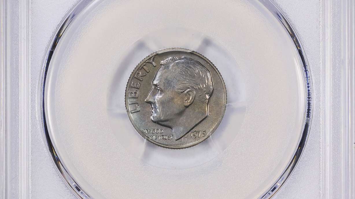 This undated image provided by GreatCollections shows a 1975 proof set dime mistakenly made without the San Francisco Mint's letter S mintmark.