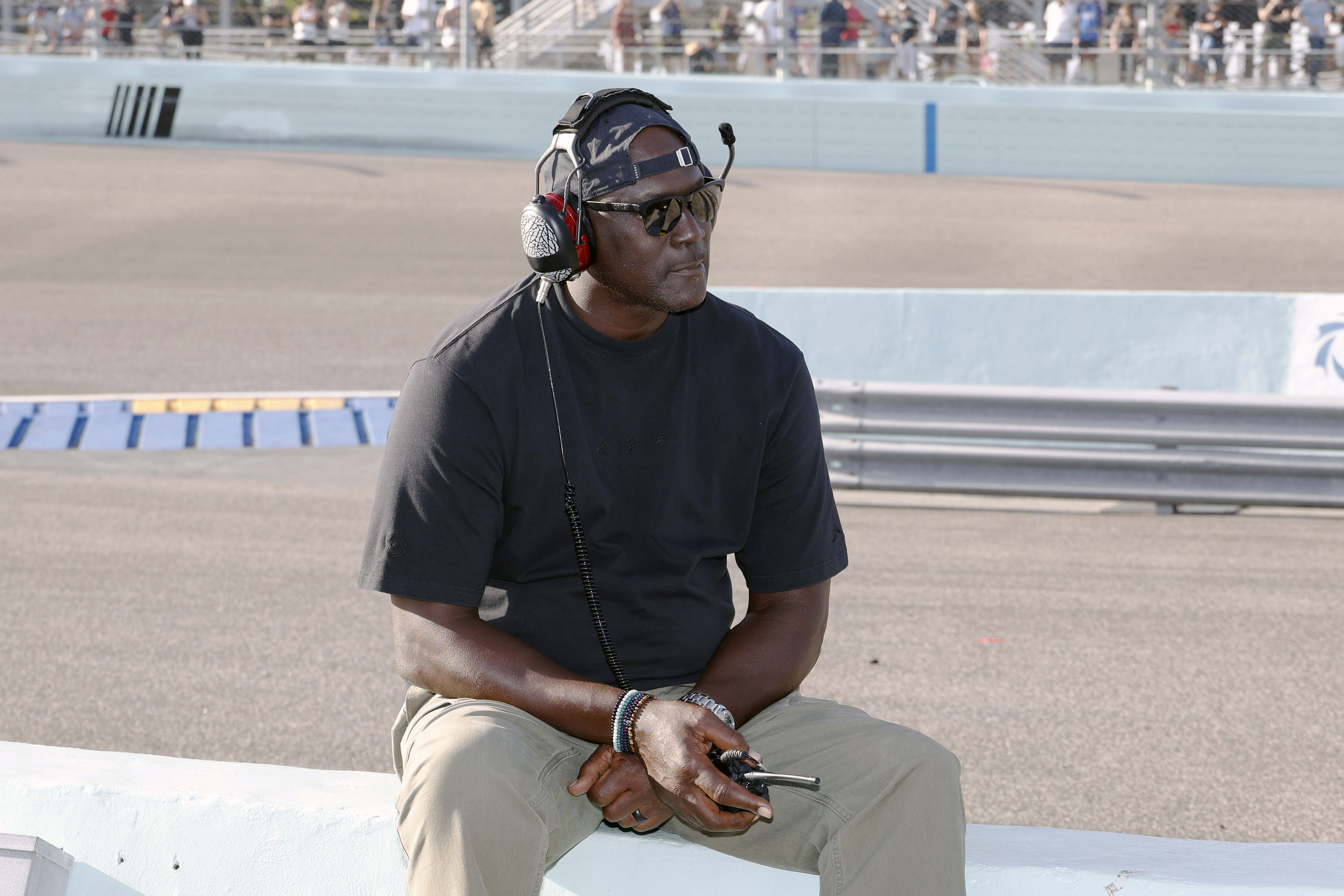 Car owner Michael Jordan watches from the pits during a NASCAR Cup Series auto race at Homestead-Miami Speedway in Homestead, Fla., Sunday, Oct. 27, 2024. 