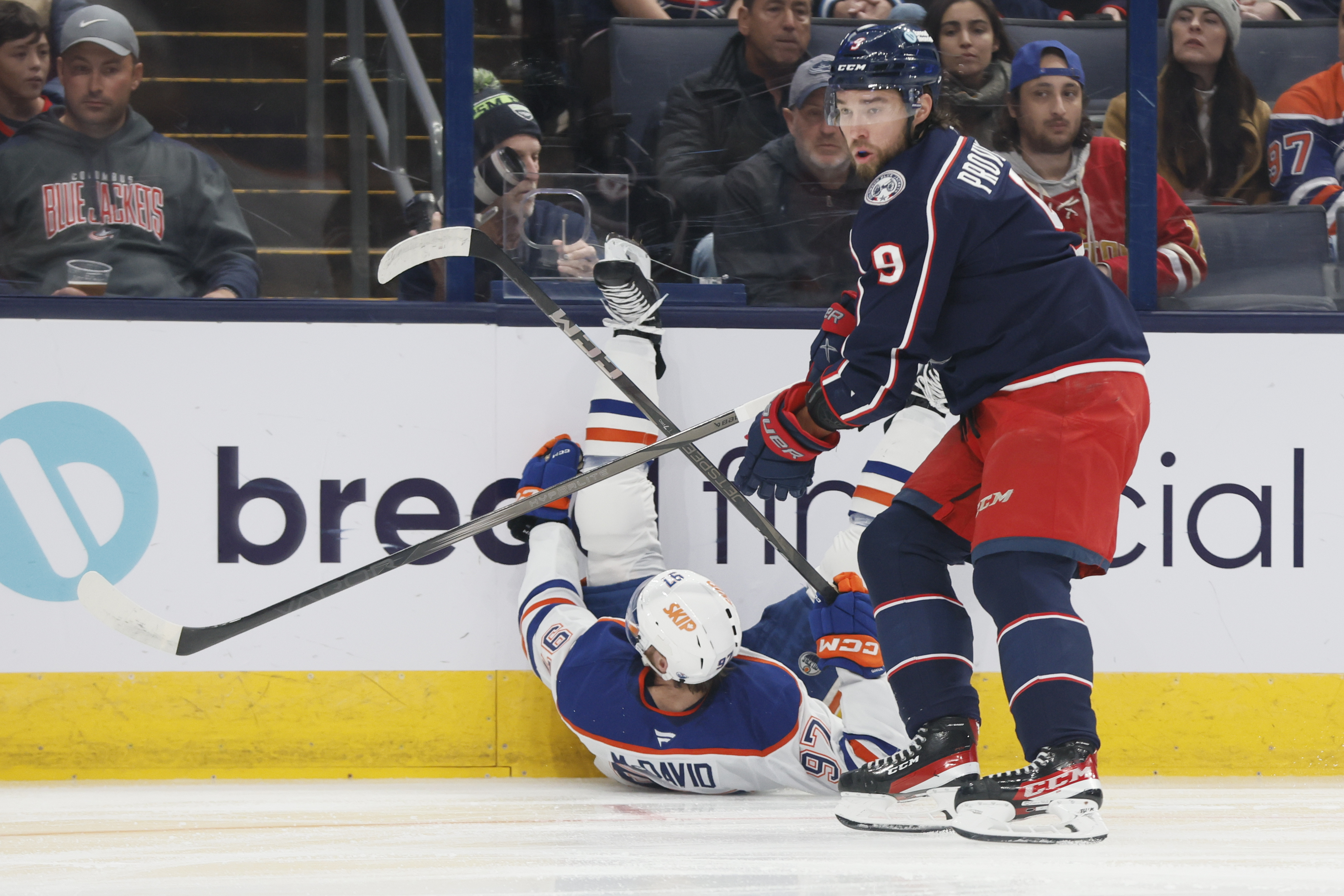 Connor McDavid injured on his first shift, returning to Edmonton to be evaluated