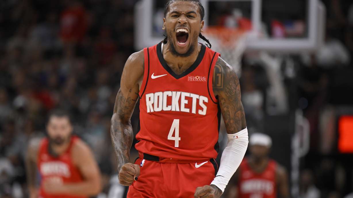 Houston Rockets' Jalen Green celebrates after a 3-point basket during the first half of an NBA basketball game against the San Antonio Spurs, Monday, Oct. 28, 2024, in San Antonio.