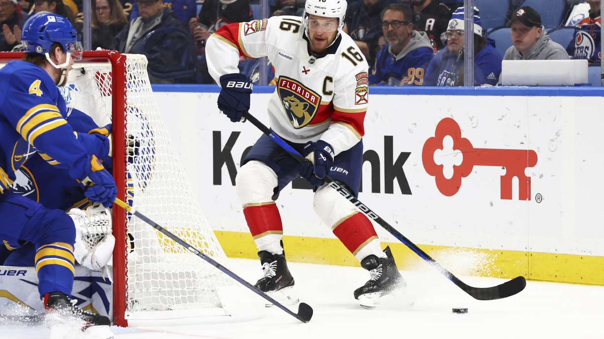 Florida Panthers center Aleksander Barkov (16) looks to pass the puck during the second period of an NHL hockey game against the Buffalo Sabres, Monday, Oct. 28, 2024, in Buffalo, N.Y.