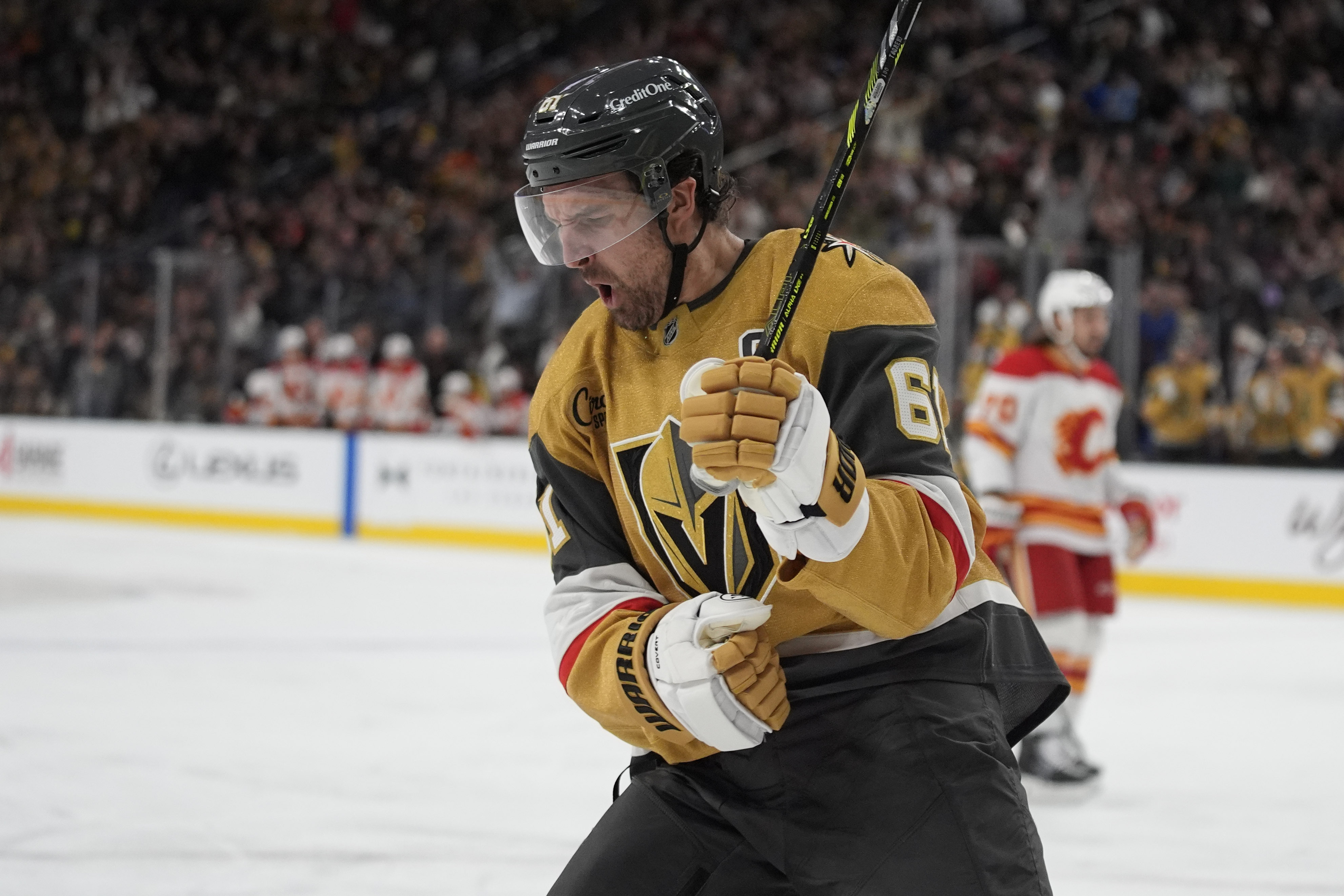 Vegas Golden Knights right wing Mark Stone (61) celebrates after scoring against the Calgary Flames during the second period of an NHL hockey game Monday, Oct. 28, 2024, in Las Vegas. 