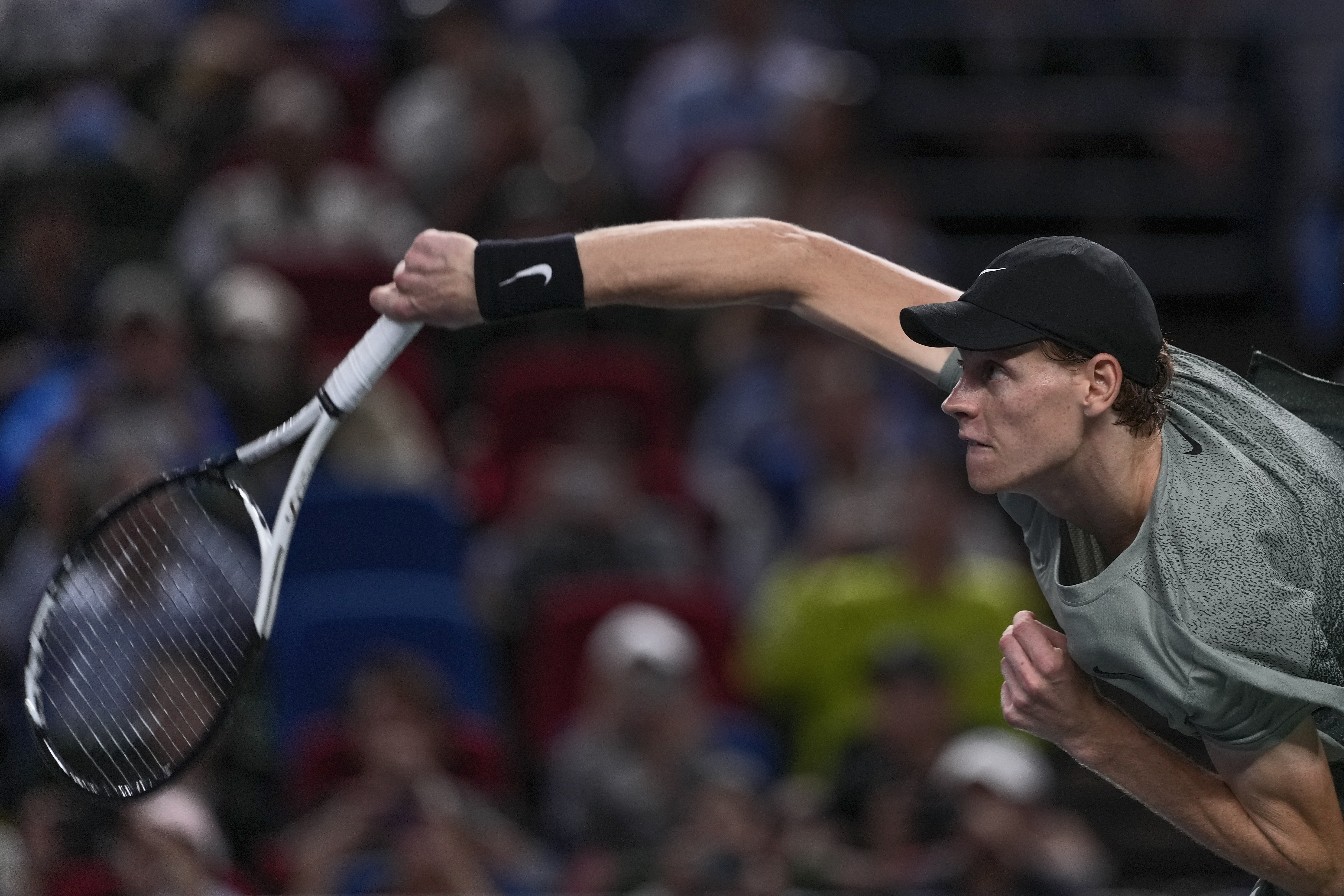 Jannik Sinner of Italy serves his winning shot against Novak Djokovic of Serbia during the men's singles match in the Shanghai Masters tennis tournament at Qizhong Forest Sports City Tennis Center in Shanghai, China, Sunday, Oct. 13, 2024. 