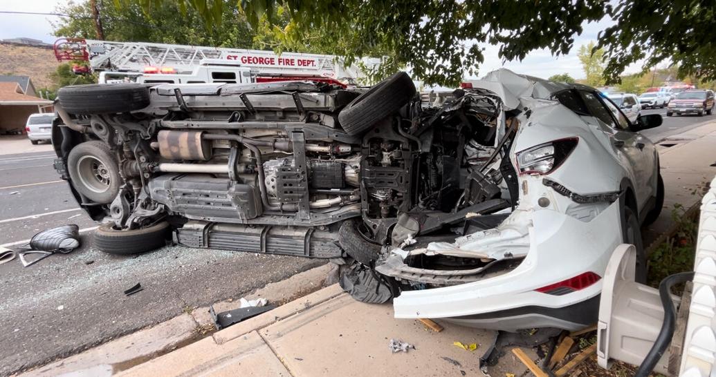 Three cars hit on Main Street were all parked on the side of the road, St. George, Sunday. 