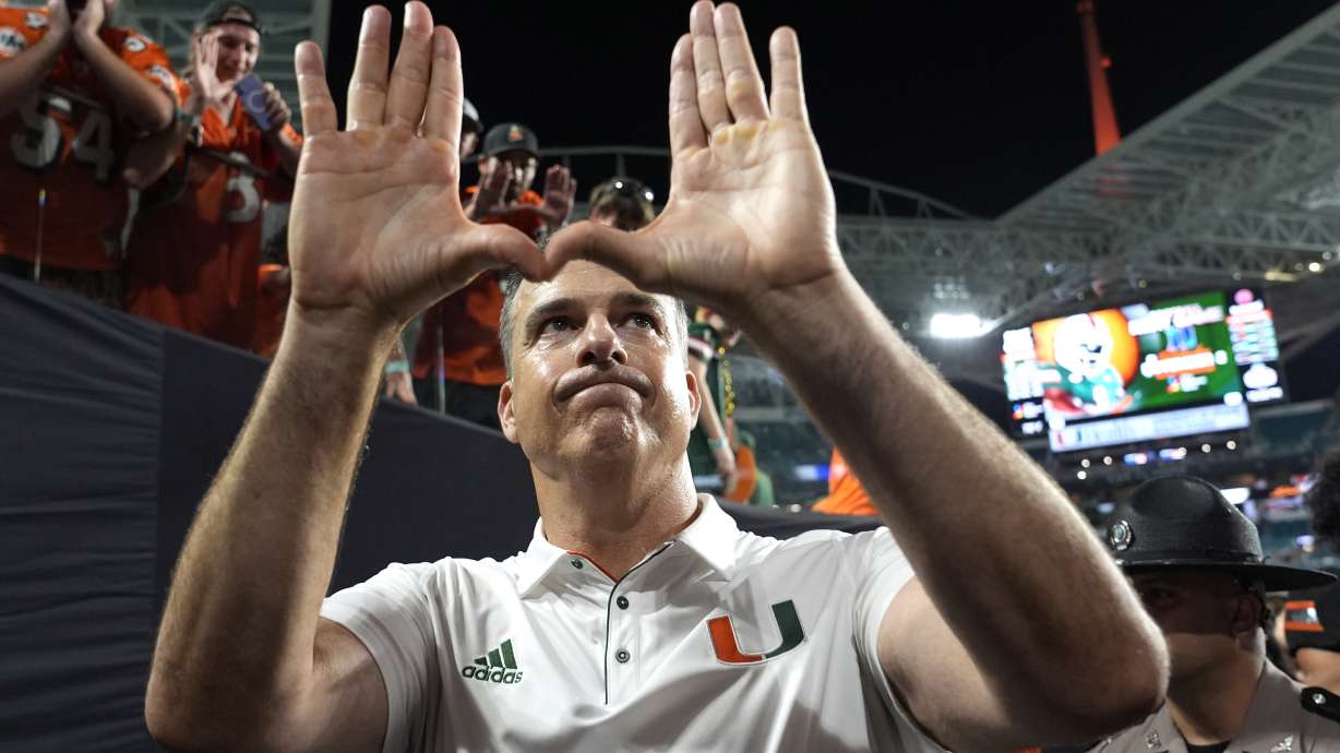Miami head coach Mario Cristobal acknowledges the crowd after an NCAA college football game against Florida State, Saturday, Oct. 26, 2024, in Miami Gardens, Fla.