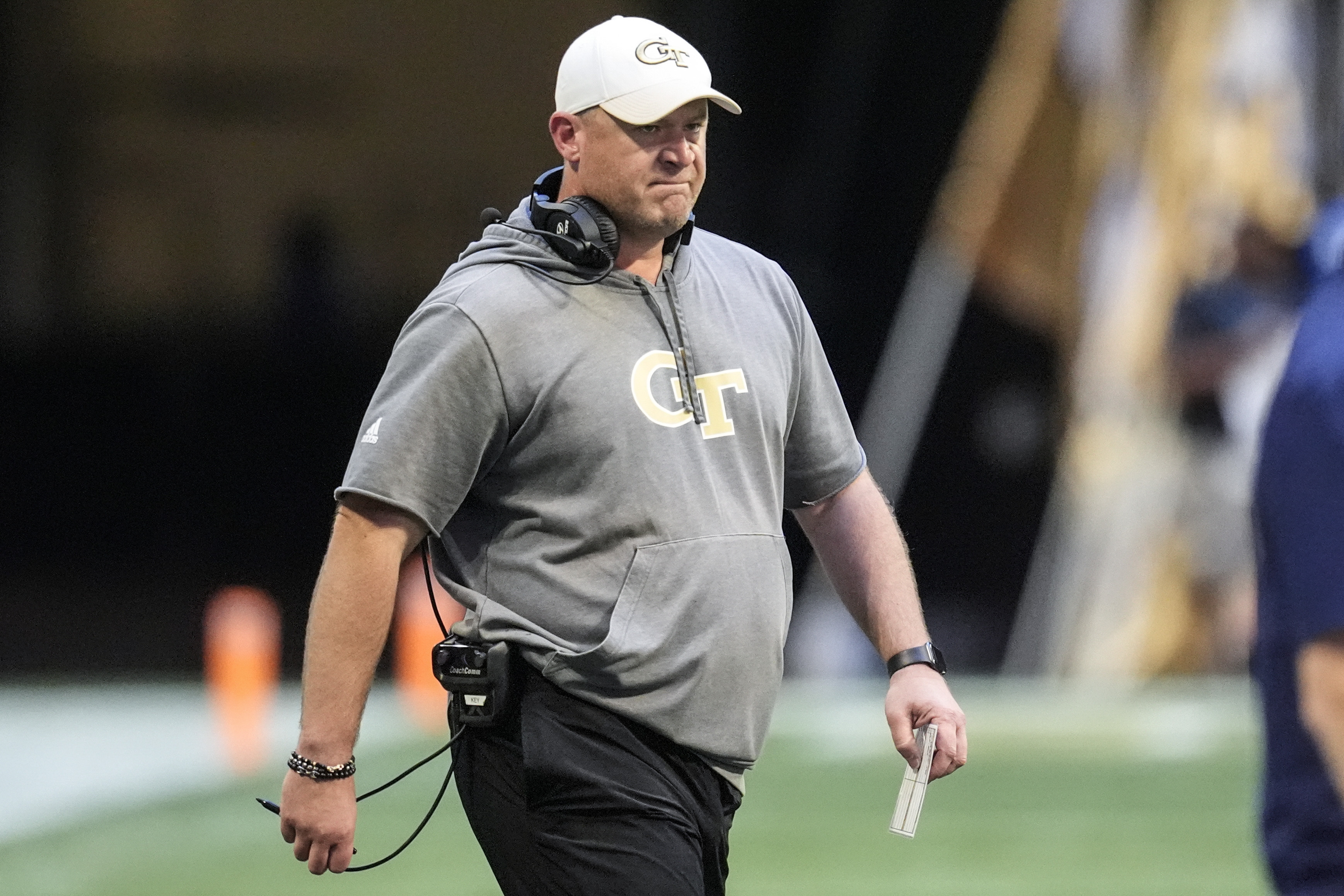 Georgia Tech head coach Brent Key ealks on the field during the first half of an NCAA college football game against Notre Dame, Saturday, Oct. 19, 2024, in Atlanta. 