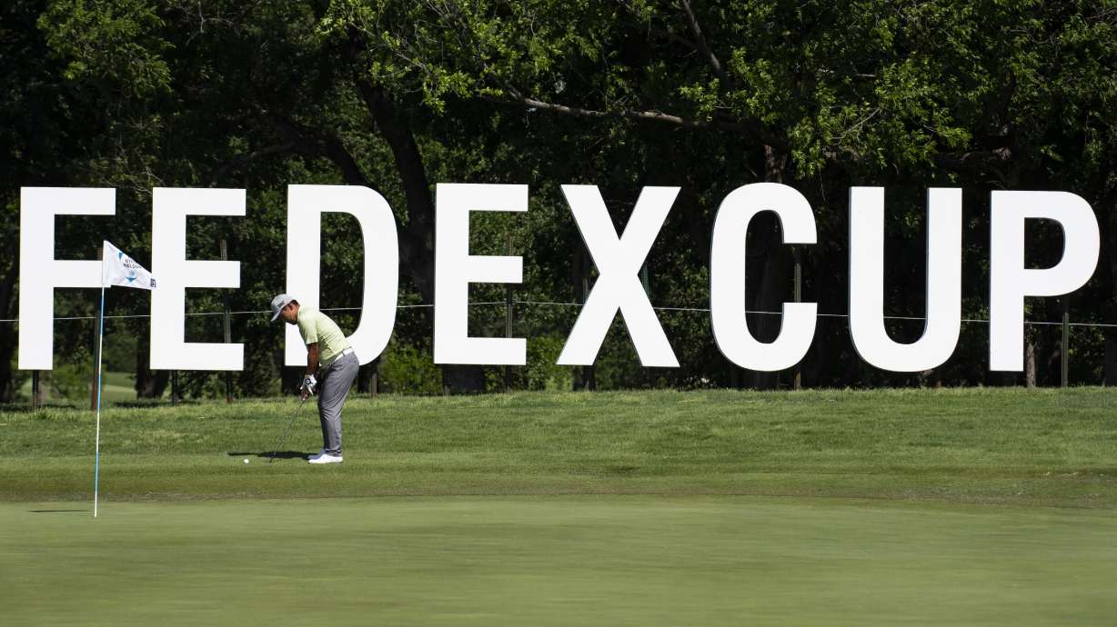 FILE - Sung Kang, of South Korea, hits a shot off of the 10th hole during the first round of the AT&T Byron Nelson golf tournament in McKinney, Texas, on Thursday, May 12, 2022.