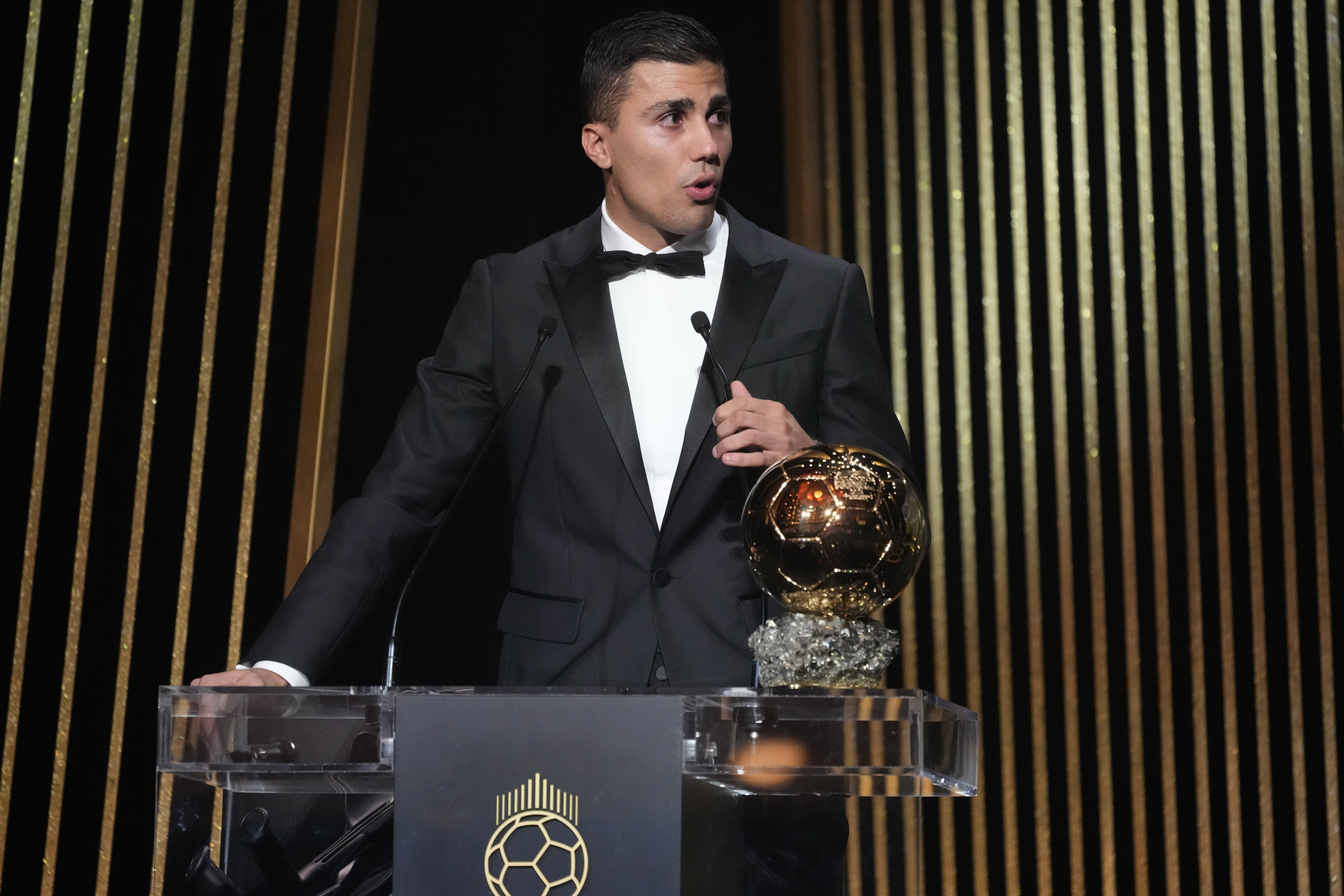 Manchester City's Spanish player Rodri delivers his speech as he receives the 2024 Men's Ballon d'Or award during the 68th Ballon d'Or (Golden Ball) award ceremony at Theatre du Chatelet in Paris, Monday, Oct. 28, 2024.
